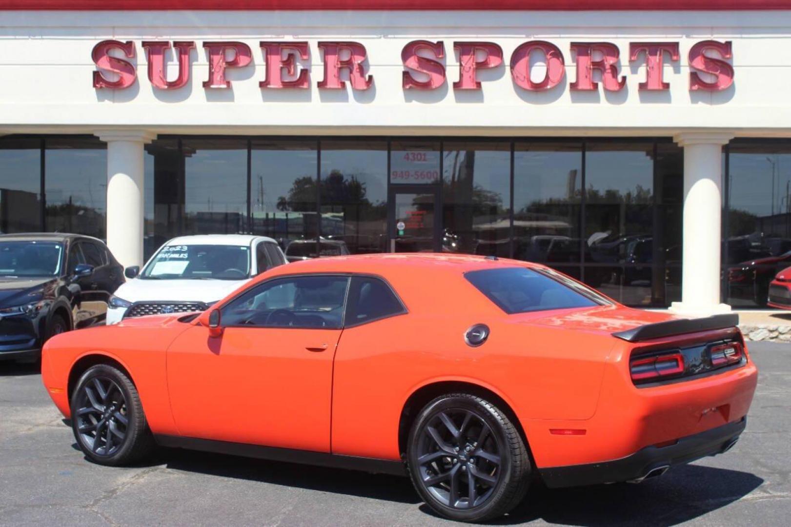 2021 Orange Dodge Challenger SXT (2C3CDZAG1MH) with an 3.6L V6 DOHC 24V engine, 8A transmission, located at 4301 NW 39th , Oklahoma City, OK, 73112, (405) 949-5600, 35.512135, -97.598671 - MUST SEE. NO DRIVERS LICENCE NO-FULL COVERAGE INSURANCE-NO CREDIT CHECK. COME ON OVER TO SUPERSPORTS AND TAKE A LOOK AND TEST DRIVE. PLEASE GIVE US A CALL AT (405) 949-5600. NO LICENSIA DE MANEJAR- NO SEGURO DE COBERTURA TOTAL- NO VERIFICACCION DE CREDITO. POR FAVOR VENGAN A SUPERS - Photo#4