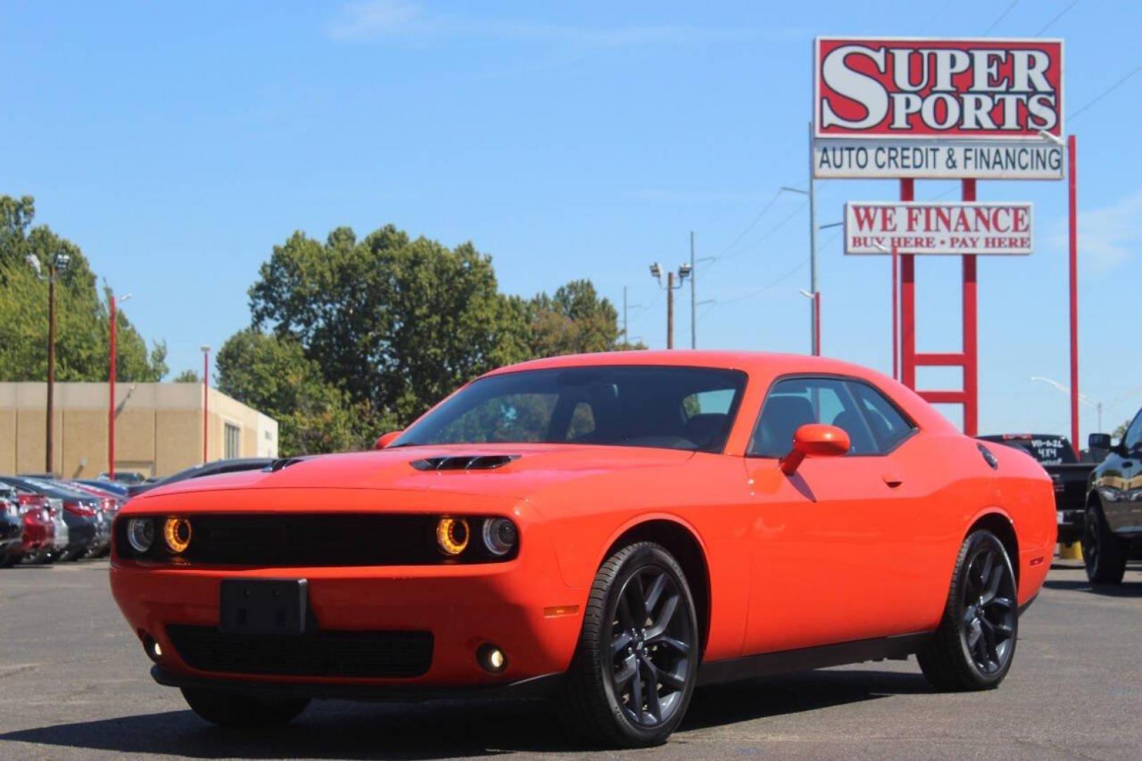 2021 Orange Dodge Challenger SXT (2C3CDZAG1MH) with an 3.6L V6 DOHC 24V engine, 8A transmission, located at 4301 NW 39th , Oklahoma City, OK, 73112, (405) 949-5600, 35.512135, -97.598671 - MUST SEE. NO DRIVERS LICENCE NO-FULL COVERAGE INSURANCE-NO CREDIT CHECK. COME ON OVER TO SUPERSPORTS AND TAKE A LOOK AND TEST DRIVE. PLEASE GIVE US A CALL AT (405) 949-5600. NO LICENSIA DE MANEJAR- NO SEGURO DE COBERTURA TOTAL- NO VERIFICACCION DE CREDITO. POR FAVOR VENGAN A SUPERS - Photo#6