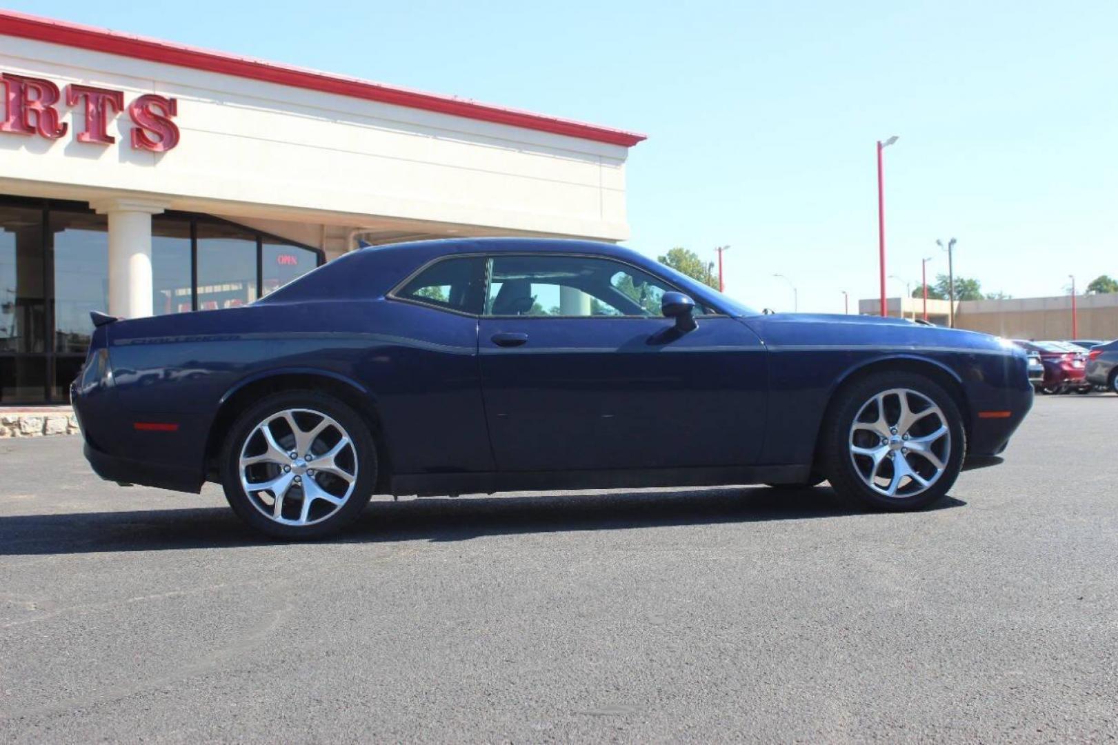 2015 Blue Dodge Challenger SXT Plus (2C3CDZBG9FH) with an 3.6L V6 DOHC 24V engine, 5-Speed Automatic transmission, located at 4301 NW 39th , Oklahoma City, OK, 73112, (405) 949-5600, 35.512135, -97.598671 - MUST SEE. NO DRIVERS LICENCE NO-FULL COVERAGE INSURANCE-NO CREDIT CHECK. COME ON OVER TO SUPERSPORTS AND TAKE A LOOK AND TEST DRIVE. PLEASE GIVE US A CALL AT (405) 949-5600. NO LICENSIA DE MANEJAR- NO SEGURO DE COBERTURA TOTAL- NO VERIFICACCION DE CREDITO. POR FAVOR VENGAN A SUPERS - Photo#2