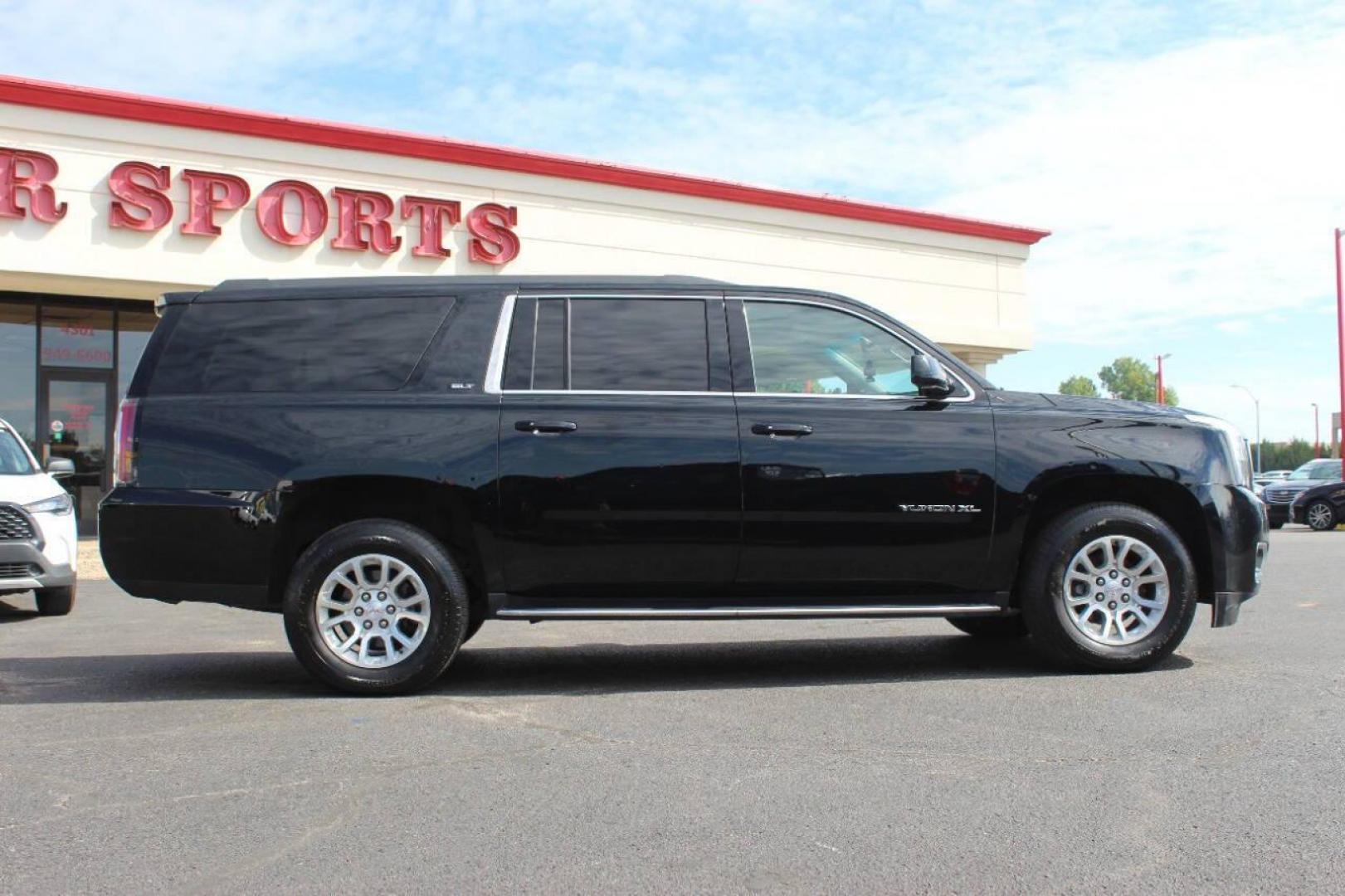 2019 Black GMC Yukon XL SLT 4WD (1GKS2GKCXKR) with an 5.3L V8 OHV 16V engine, 6A transmission, located at 4301 NW 39th , Oklahoma City, OK, 73112, (405) 949-5600, 35.512135, -97.598671 - NO DRIVERS LICENCE NO-FULL COVERAGE INSURANCE-NO CREDIT CHECK. COME ON OVER TO SUPERSPORTS AND TAKE A LOOK AND TEST DRIVE. PLEASE GIVE US A CALL AT (405) 949-5600. NO LICENSIA DE MANEJAR- NO SEGURO DE COBERTURA TOTAL- NO VERIFICACCION DE CREDITO. POR FAVOR VENGAN A SUPERSPORTS, ECHE UN - Photo#2