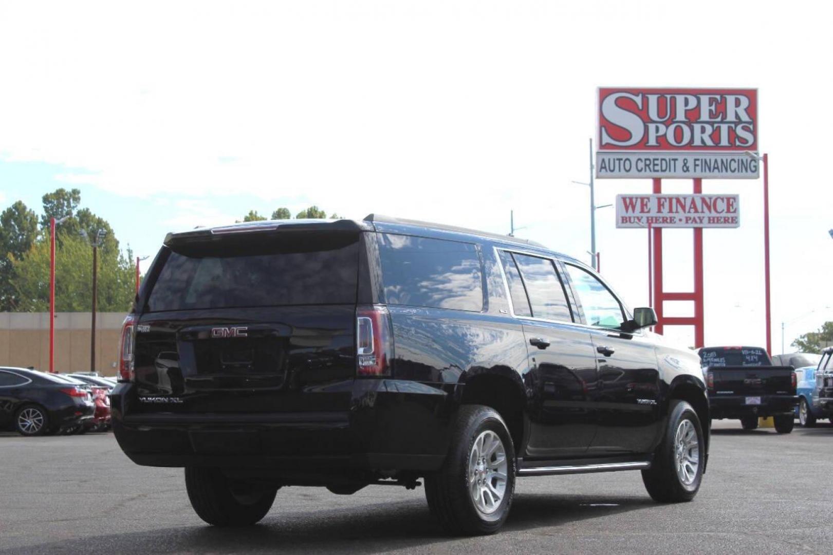 2019 Black GMC Yukon XL SLT 4WD (1GKS2GKCXKR) with an 5.3L V8 OHV 16V engine, 6A transmission, located at 4301 NW 39th , Oklahoma City, OK, 73112, (405) 949-5600, 35.512135, -97.598671 - NO DRIVERS LICENCE NO-FULL COVERAGE INSURANCE-NO CREDIT CHECK. COME ON OVER TO SUPERSPORTS AND TAKE A LOOK AND TEST DRIVE. PLEASE GIVE US A CALL AT (405) 949-5600. NO LICENSIA DE MANEJAR- NO SEGURO DE COBERTURA TOTAL- NO VERIFICACCION DE CREDITO. POR FAVOR VENGAN A SUPERSPORTS, ECHE UN - Photo#3