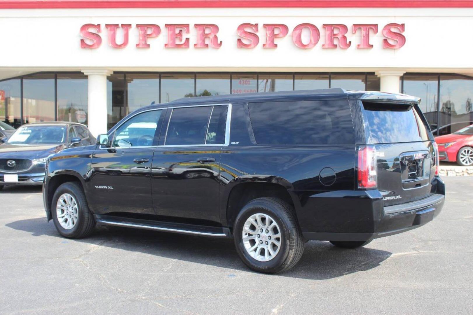 2019 Black GMC Yukon XL SLT 4WD (1GKS2GKCXKR) with an 5.3L V8 OHV 16V engine, 6A transmission, located at 4301 NW 39th , Oklahoma City, OK, 73112, (405) 949-5600, 35.512135, -97.598671 - NO DRIVERS LICENCE NO-FULL COVERAGE INSURANCE-NO CREDIT CHECK. COME ON OVER TO SUPERSPORTS AND TAKE A LOOK AND TEST DRIVE. PLEASE GIVE US A CALL AT (405) 949-5600. NO LICENSIA DE MANEJAR- NO SEGURO DE COBERTURA TOTAL- NO VERIFICACCION DE CREDITO. POR FAVOR VENGAN A SUPERSPORTS, ECHE UN - Photo#4