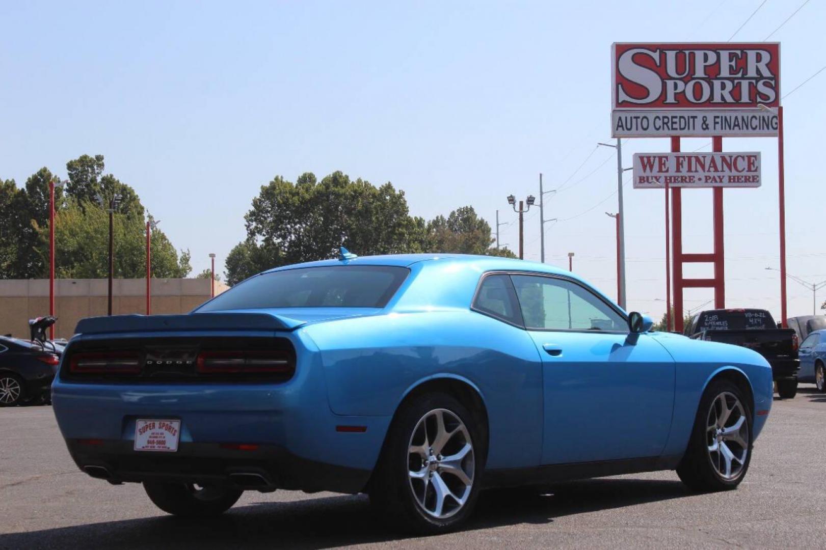 2016 Blue Dodge Challenger SXT (2C3CDZAG5GH) with an 3.6L V6 DOHC 24V engine, 5A transmission, located at 4301 NW 39th , Oklahoma City, OK, 73112, (405) 949-5600, 35.512135, -97.598671 - NO DRIVERS LICENCE NO-FULL COVERAGE INSURANCE-NO CREDIT CHECK. COME ON OVER TO SUPERSPORTS AND TAKE A LOOK AND TEST DRIVE. PLEASE GIVE US A CALL AT (405) 949-5600. NO LICENSIA DE MANEJAR- NO SEGURO DE COBERTURA TOTAL- NO VERIFICACCION DE CREDITO. POR FAVOR VENGAN A SUPERSPORTS, ECHE UN - Photo#3