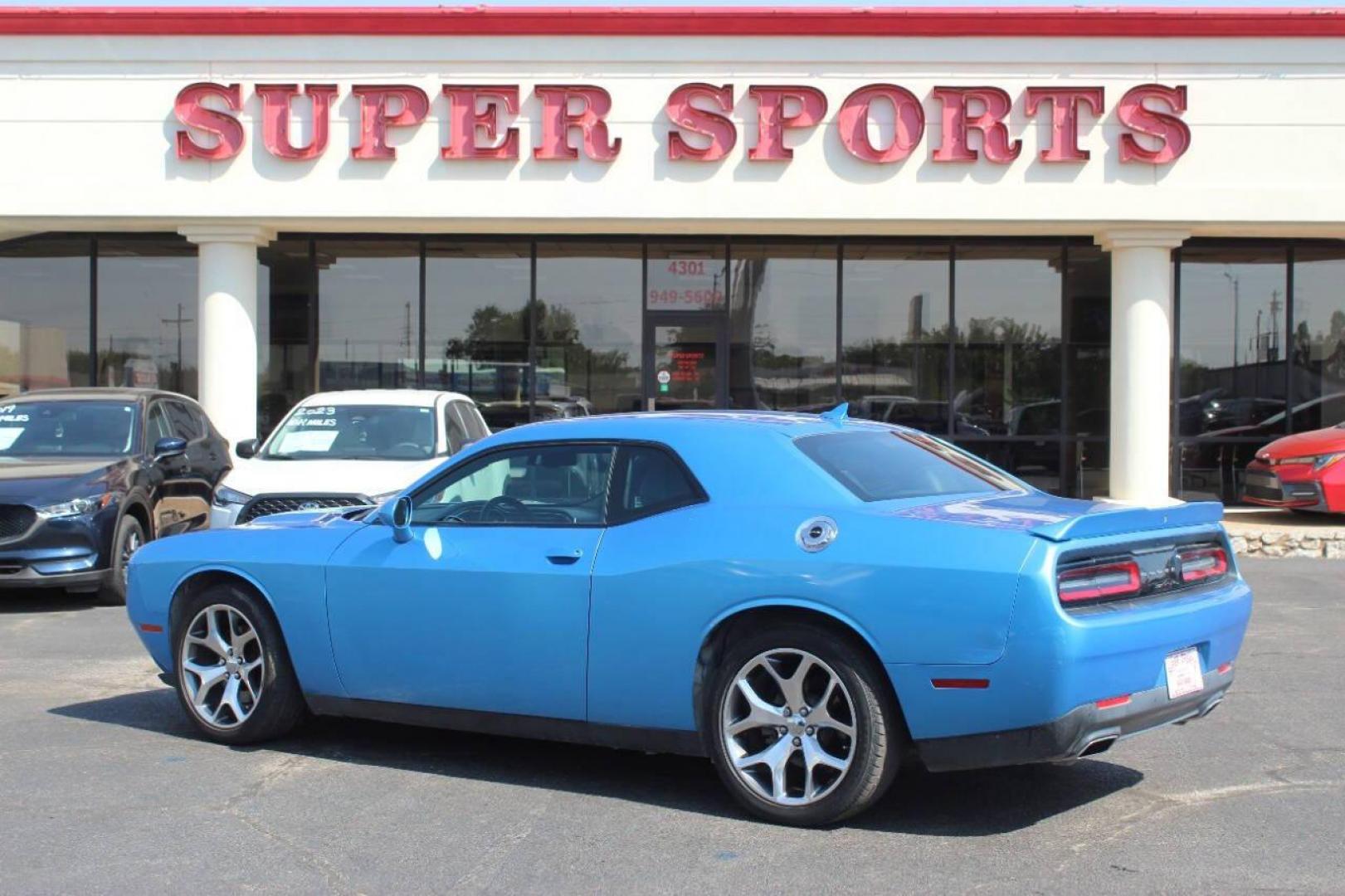 2016 Blue Dodge Challenger SXT (2C3CDZAG5GH) with an 3.6L V6 DOHC 24V engine, 5A transmission, located at 4301 NW 39th , Oklahoma City, OK, 73112, (405) 949-5600, 35.512135, -97.598671 - NO DRIVERS LICENCE NO-FULL COVERAGE INSURANCE-NO CREDIT CHECK. COME ON OVER TO SUPERSPORTS AND TAKE A LOOK AND TEST DRIVE. PLEASE GIVE US A CALL AT (405) 949-5600. NO LICENSIA DE MANEJAR- NO SEGURO DE COBERTURA TOTAL- NO VERIFICACCION DE CREDITO. POR FAVOR VENGAN A SUPERSPORTS, ECHE UN - Photo#4