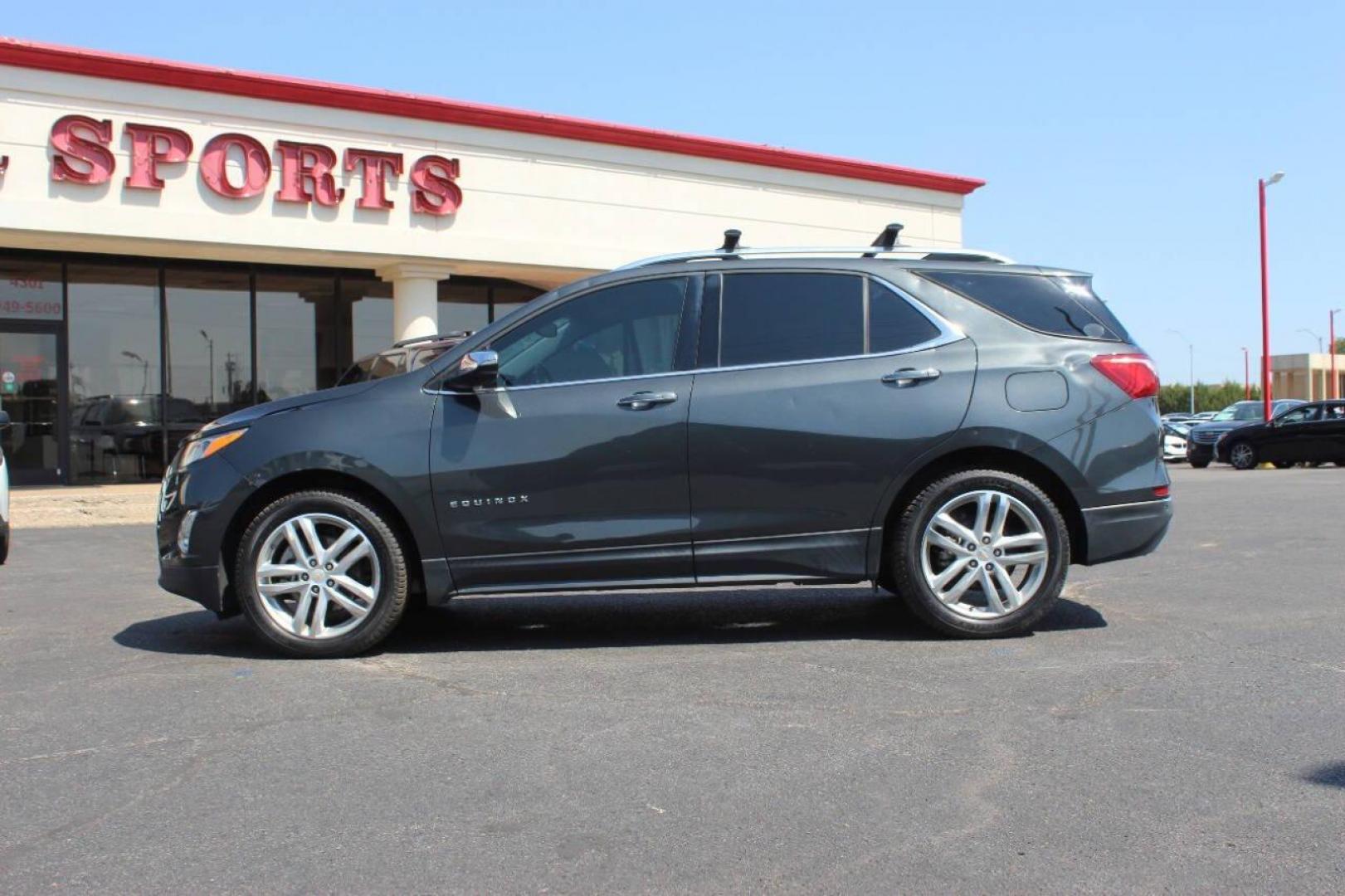 2018 Gray Chevrolet Equinox Premier (2GNAXNEX8J6) with an 2.0L L4 DOHC 24V HYBRID engine, 6A transmission, located at 4301 NW 39th , Oklahoma City, OK, 73112, (405) 949-5600, 35.512135, -97.598671 - NO DRIVERS LICENCE NO-FULL COVERAGE INSURANCE-NO CREDIT CHECK. COME ON OVER TO SUPERSPORTS AND TAKE A LOOK AND TEST DRIVE. PLEASE GIVE US A CALL AT (405) 949-5600. NO LICENSIA DE MANEJAR- NO SEGURO DE COBERTURA TOTAL- NO VERIFICACCION DE CREDITO. POR FAVOR VENGAN A SUPERSPORTS, ECHE UN - Photo#5