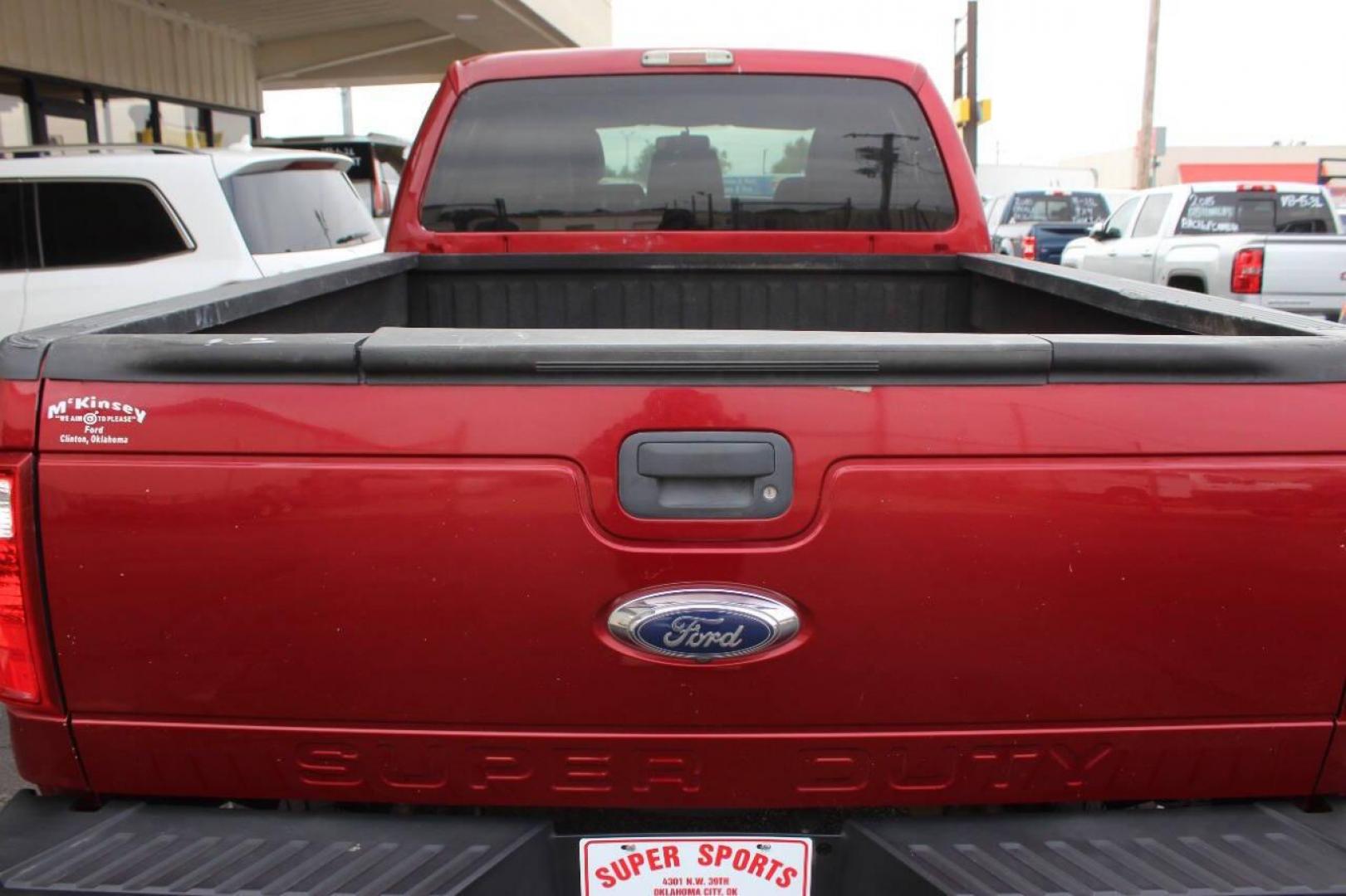 2015 Red Ford F-250 SD King Ranch Crew Cab 4WD (1FT7W2BT3FE) with an 6.7L V8 OHV 16V DIESEL engine, 6-Speed Automatic transmission, located at 4301 NW 39th , Oklahoma City, OK, 73112, (405) 949-5600, 35.512135, -97.598671 - Photo#12