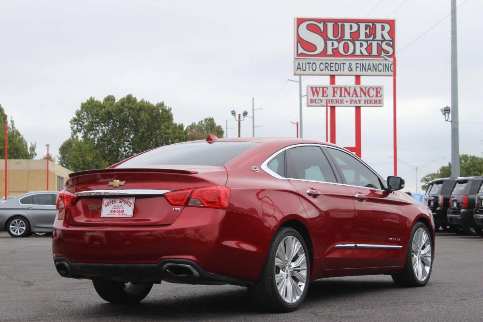 2014 Red Chevrolet Impala 2LZ (1G1155S36EU) with an 3.6L V6 DOHC 24VV FFV engine, 6-Speed Automatic transmission, located at 4301 NW 39th , Oklahoma City, OK, 73112, (405) 949-5600, 35.512135, -97.598671 - NO DRIVERS LICENCE NO-FULL COVERAGE INSURANCE-NO CREDIT CHECK. COME ON OVER TO SUPERSPORTS AND TAKE A LOOK AND TEST DRIVE. PLEASE GIVE US A CALL AT (405) 949-5600. NO LICENSIA DE MANEJAR- NO SEGURO DE COBERTURA TOTAL- NO VERIFICACCION DE CREDITO. POR FAVOR VENGAN A SUPERSPORTS, ECHE UN - Photo#3