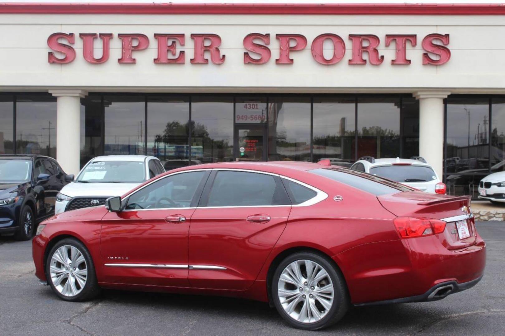 2014 Red Chevrolet Impala 2LZ (1G1155S36EU) with an 3.6L V6 DOHC 24VV FFV engine, 6-Speed Automatic transmission, located at 4301 NW 39th , Oklahoma City, OK, 73112, (405) 949-5600, 35.512135, -97.598671 - NO DRIVERS LICENCE NO-FULL COVERAGE INSURANCE-NO CREDIT CHECK. COME ON OVER TO SUPERSPORTS AND TAKE A LOOK AND TEST DRIVE. PLEASE GIVE US A CALL AT (405) 949-5600. NO LICENSIA DE MANEJAR- NO SEGURO DE COBERTURA TOTAL- NO VERIFICACCION DE CREDITO. POR FAVOR VENGAN A SUPERSPORTS, ECHE UN - Photo#4