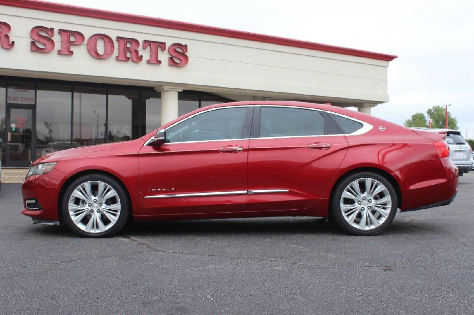 2014 Red Chevrolet Impala 2LZ (1G1155S36EU) with an 3.6L V6 DOHC 24VV FFV engine, 6-Speed Automatic transmission, located at 4301 NW 39th , Oklahoma City, OK, 73112, (405) 949-5600, 35.512135, -97.598671 - NO DRIVERS LICENCE NO-FULL COVERAGE INSURANCE-NO CREDIT CHECK. COME ON OVER TO SUPERSPORTS AND TAKE A LOOK AND TEST DRIVE. PLEASE GIVE US A CALL AT (405) 949-5600. NO LICENSIA DE MANEJAR- NO SEGURO DE COBERTURA TOTAL- NO VERIFICACCION DE CREDITO. POR FAVOR VENGAN A SUPERSPORTS, ECHE UN - Photo#5