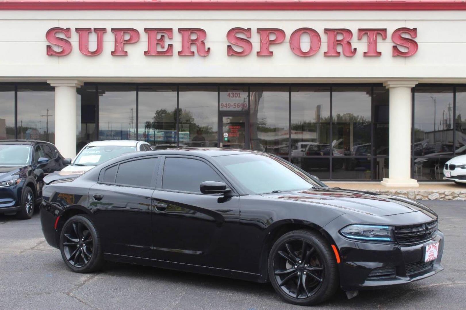 2016 Black Dodge Charger SE (2C3CDXBG0GH) with an 3.6L V6 DOHC 24V engine, 8A transmission, located at 4301 NW 39th , Oklahoma City, OK, 73112, (405) 949-5600, 35.512135, -97.598671 - Photo#0