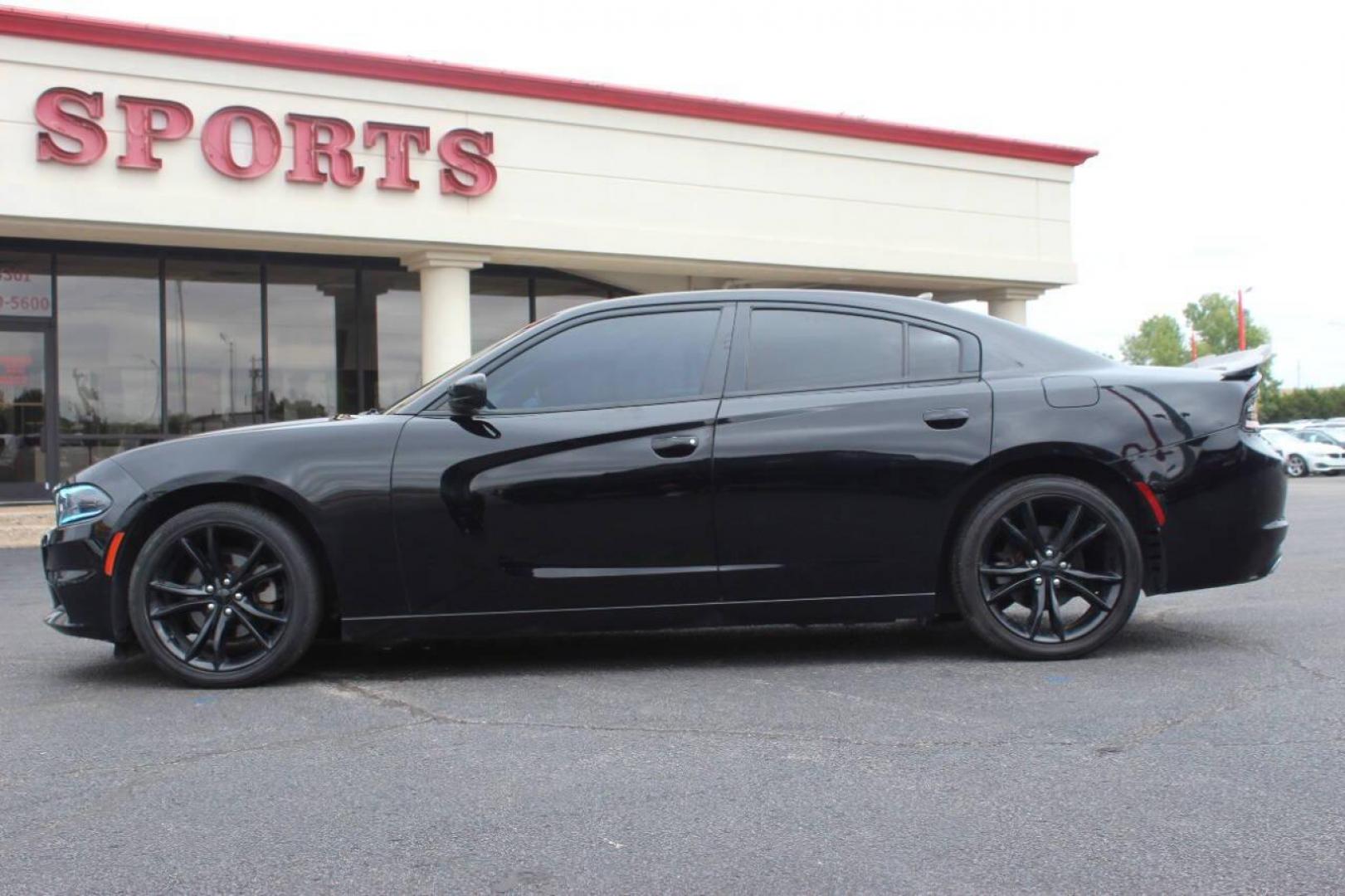 2016 Black Dodge Charger SE (2C3CDXBG0GH) with an 3.6L V6 DOHC 24V engine, 8A transmission, located at 4301 NW 39th , Oklahoma City, OK, 73112, (405) 949-5600, 35.512135, -97.598671 - Photo#5