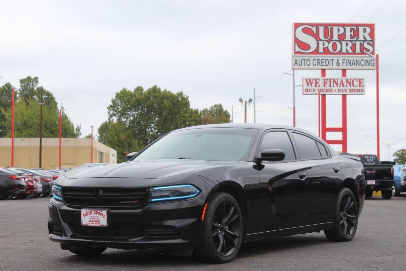 2016 Black Dodge Charger SE (2C3CDXBG0GH) with an 3.6L V6 DOHC 24V engine, 8A transmission, located at 4301 NW 39th , Oklahoma City, OK, 73112, (405) 949-5600, 35.512135, -97.598671 - NO DRIVERS LICENCE NO-FULL COVERAGE INSURANCE-NO CREDIT CHECK. COME ON OVER TO SUPERSPORTS AND TAKE A LOOK AND TEST DRIVE. PLEASE GIVE US A CALL AT (405) 949-5600. NO LICENSIA DE MANEJAR- NO SEGURO DE COBERTURA TOTAL- NO VERIFICACCION DE CREDITO. POR FAVOR VENGAN A SUPERSPORTS, ECHE UN - Photo#6