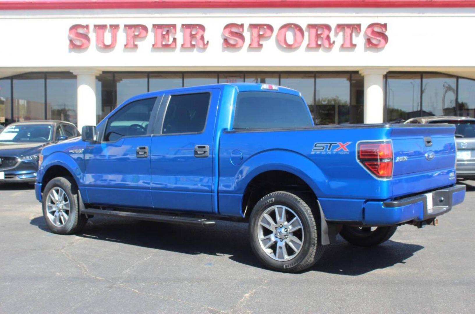 2014 Blue Ford F-150 XL SuperCrew 5.5-ft. Bed 4WD (1FTFW1EF2EK) with an 5.0L V8 engine, 6-Speed Automatic transmission, located at 4301 NW 39th , Oklahoma City, OK, 73112, (405) 949-5600, 35.512135, -97.598671 - NO DRIVERS LICENCE NO-FULL COVERAGE INSURANCE-NO CREDIT CHECK. COME ON OVER TO SUPERSPORTS AND TAKE A LOOK AND TEST DRIVE. PLEASE GIVE US A CALL AT (405) 949-5600. NO LICENSIA DE MANEJAR- NO SEGURO DE COBERTURA TOTAL- NO VERIFICACCION DE CREDITO. POR FAVOR VENGAN A SUPERSPORTS, ECHE UN - Photo#4