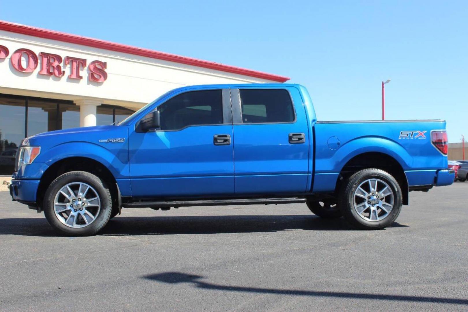 2014 Blue Ford F-150 XL SuperCrew 5.5-ft. Bed 4WD (1FTFW1EF2EK) with an 5.0L V8 engine, 6-Speed Automatic transmission, located at 4301 NW 39th , Oklahoma City, OK, 73112, (405) 949-5600, 35.512135, -97.598671 - NO DRIVERS LICENCE NO-FULL COVERAGE INSURANCE-NO CREDIT CHECK. COME ON OVER TO SUPERSPORTS AND TAKE A LOOK AND TEST DRIVE. PLEASE GIVE US A CALL AT (405) 949-5600. NO LICENSIA DE MANEJAR- NO SEGURO DE COBERTURA TOTAL- NO VERIFICACCION DE CREDITO. POR FAVOR VENGAN A SUPERSPORTS, ECHE UN - Photo#5