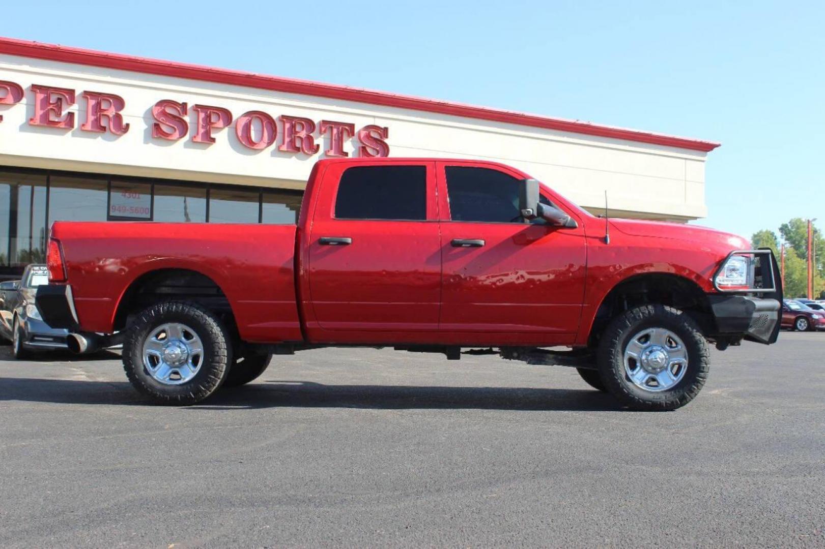 2016 Red RAM 2500 Tradesman Crew Cab SWB 4WD (3C6UR5CL6GG) with an 6.7L L6 OHV 24V TURBO DIESEL engine, 6A transmission, located at 4301 NW 39th , Oklahoma City, OK, 73112, (405) 949-5600, 35.512135, -97.598671 - NO DRIVERS LICENCE NO-FULL COVERAGE INSURANCE-NO CREDIT CHECK. COME ON OVER TO SUPERSPORTS AND TAKE A LOOK AND TEST DRIVE. PLEASE GIVE US A CALL AT (405) 949-5600. NO LICENSIA DE MANEJAR- NO SEGURO DE COBERTURA TOTAL- NO VERIFICACCION DE CREDITO. POR FAVOR VENGAN A SUPERSPORTS, ECHE UN - Photo#2