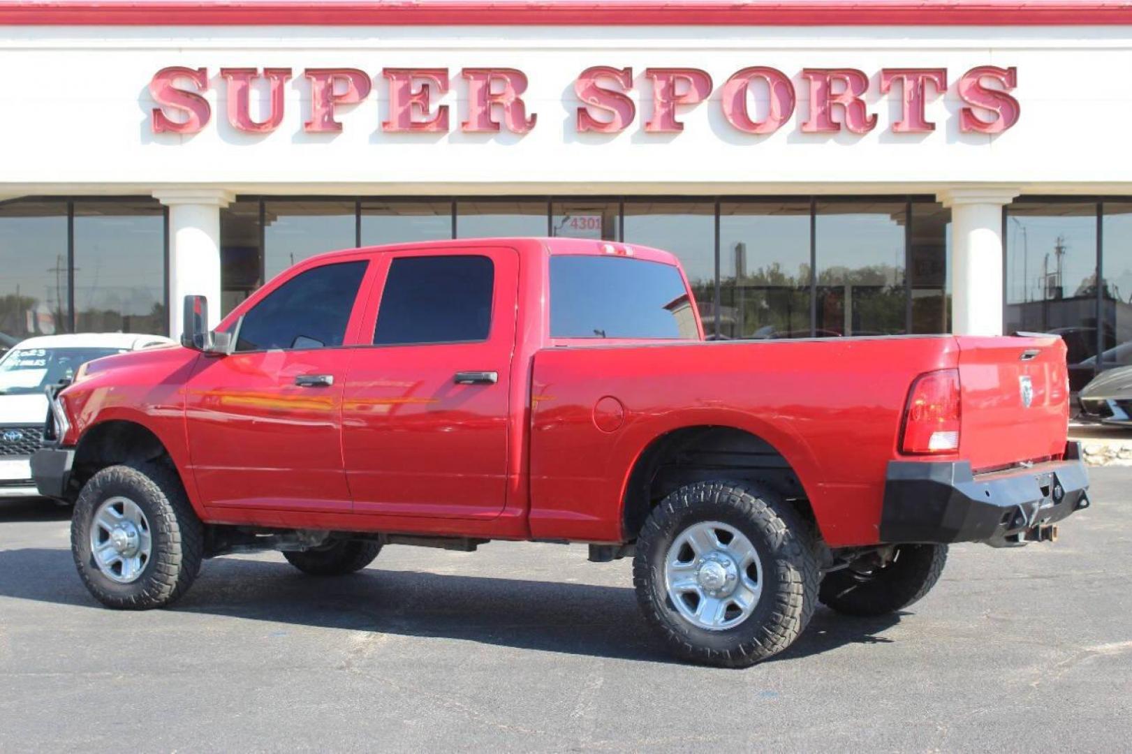 2016 Red RAM 2500 Tradesman Crew Cab SWB 4WD (3C6UR5CL6GG) with an 6.7L L6 OHV 24V TURBO DIESEL engine, 6A transmission, located at 4301 NW 39th , Oklahoma City, OK, 73112, (405) 949-5600, 35.512135, -97.598671 - NO DRIVERS LICENCE NO-FULL COVERAGE INSURANCE-NO CREDIT CHECK. COME ON OVER TO SUPERSPORTS AND TAKE A LOOK AND TEST DRIVE. PLEASE GIVE US A CALL AT (405) 949-5600. NO LICENSIA DE MANEJAR- NO SEGURO DE COBERTURA TOTAL- NO VERIFICACCION DE CREDITO. POR FAVOR VENGAN A SUPERSPORTS, ECHE UN - Photo#4