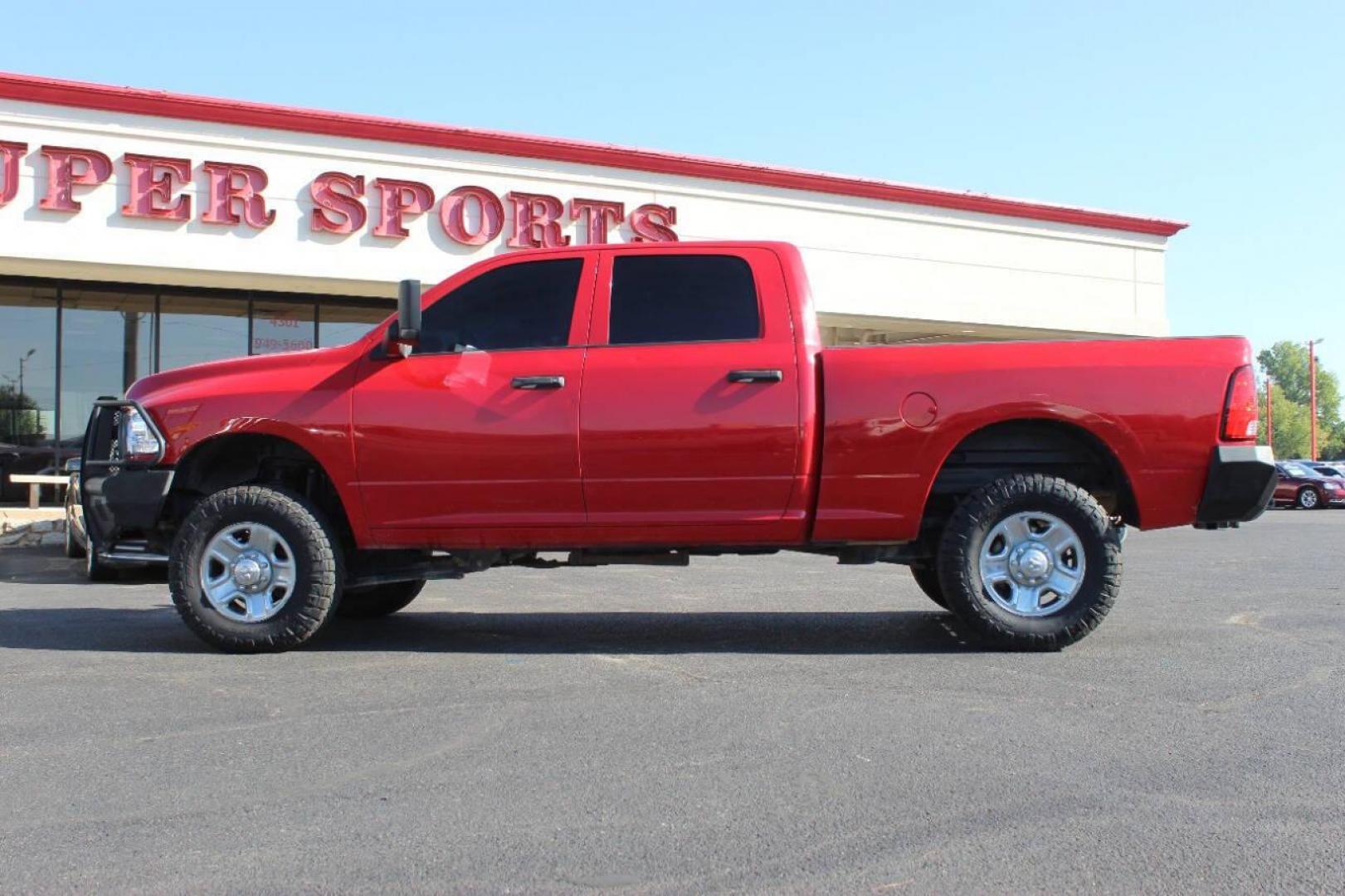 2016 Red RAM 2500 Tradesman Crew Cab SWB 4WD (3C6UR5CL6GG) with an 6.7L L6 OHV 24V TURBO DIESEL engine, 6A transmission, located at 4301 NW 39th , Oklahoma City, OK, 73112, (405) 949-5600, 35.512135, -97.598671 - NO DRIVERS LICENCE NO-FULL COVERAGE INSURANCE-NO CREDIT CHECK. COME ON OVER TO SUPERSPORTS AND TAKE A LOOK AND TEST DRIVE. PLEASE GIVE US A CALL AT (405) 949-5600. NO LICENSIA DE MANEJAR- NO SEGURO DE COBERTURA TOTAL- NO VERIFICACCION DE CREDITO. POR FAVOR VENGAN A SUPERSPORTS, ECHE UN - Photo#5