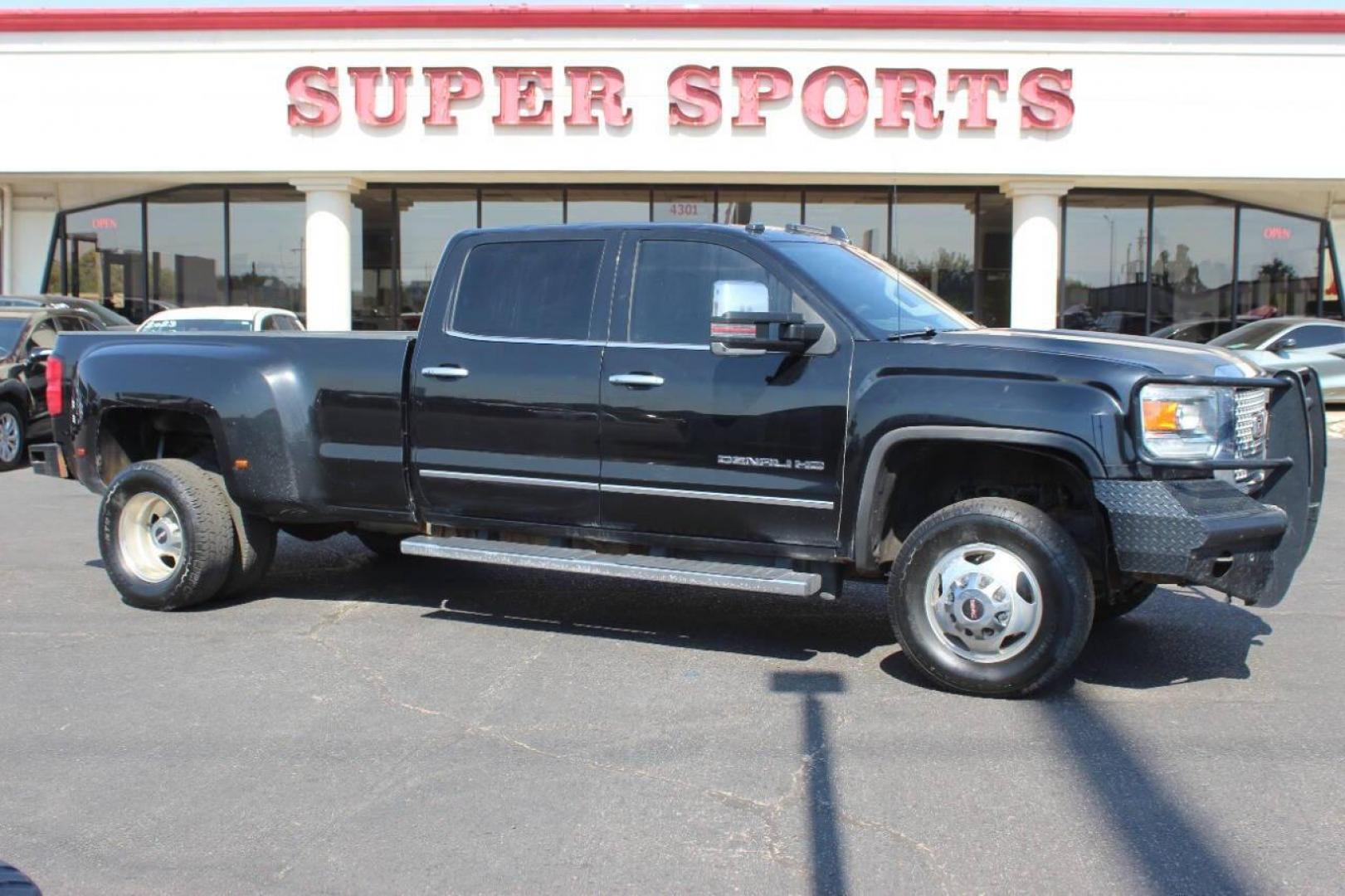 2015 Black GMC Sierra 3500HD Denali Crew Cab 4WD (1GT424E80FF) with an 6.6L V8 OHV 16 DIESEL engine, 6-Speed Automatic transmission, located at 4301 NW 39th , Oklahoma City, OK, 73112, (405) 949-5600, 35.512135, -97.598671 - NO DRIVERS LICENCE NO-FULL COVERAGE INSURANCE-NO CREDIT CHECK. COME ON OVER TO SUPERSPORTS AND TAKE A LOOK AND TEST DRIVE. PLEASE GIVE US A CALL AT (405) 949-5600. NO LICENSIA DE MANEJAR- NO SEGURO DE COBERTURA TOTAL- NO VERIFICACCION DE CREDITO. POR FAVOR VENGAN A SUPERSPORTS, ECHE UN - Photo#0