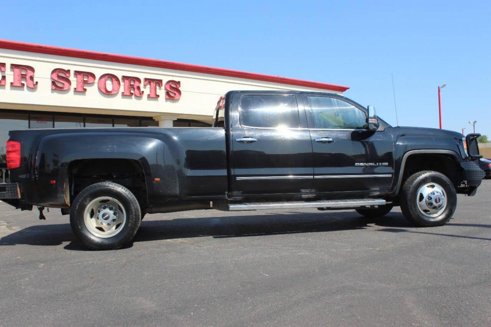 2015 Black GMC Sierra 3500HD Denali Crew Cab 4WD (1GT424E80FF) with an 6.6L V8 OHV 16 DIESEL engine, 6-Speed Automatic transmission, located at 4301 NW 39th , Oklahoma City, OK, 73112, (405) 949-5600, 35.512135, -97.598671 - NO DRIVERS LICENCE NO-FULL COVERAGE INSURANCE-NO CREDIT CHECK. COME ON OVER TO SUPERSPORTS AND TAKE A LOOK AND TEST DRIVE. PLEASE GIVE US A CALL AT (405) 949-5600. NO LICENSIA DE MANEJAR- NO SEGURO DE COBERTURA TOTAL- NO VERIFICACCION DE CREDITO. POR FAVOR VENGAN A SUPERSPORTS, ECHE UN - Photo#2