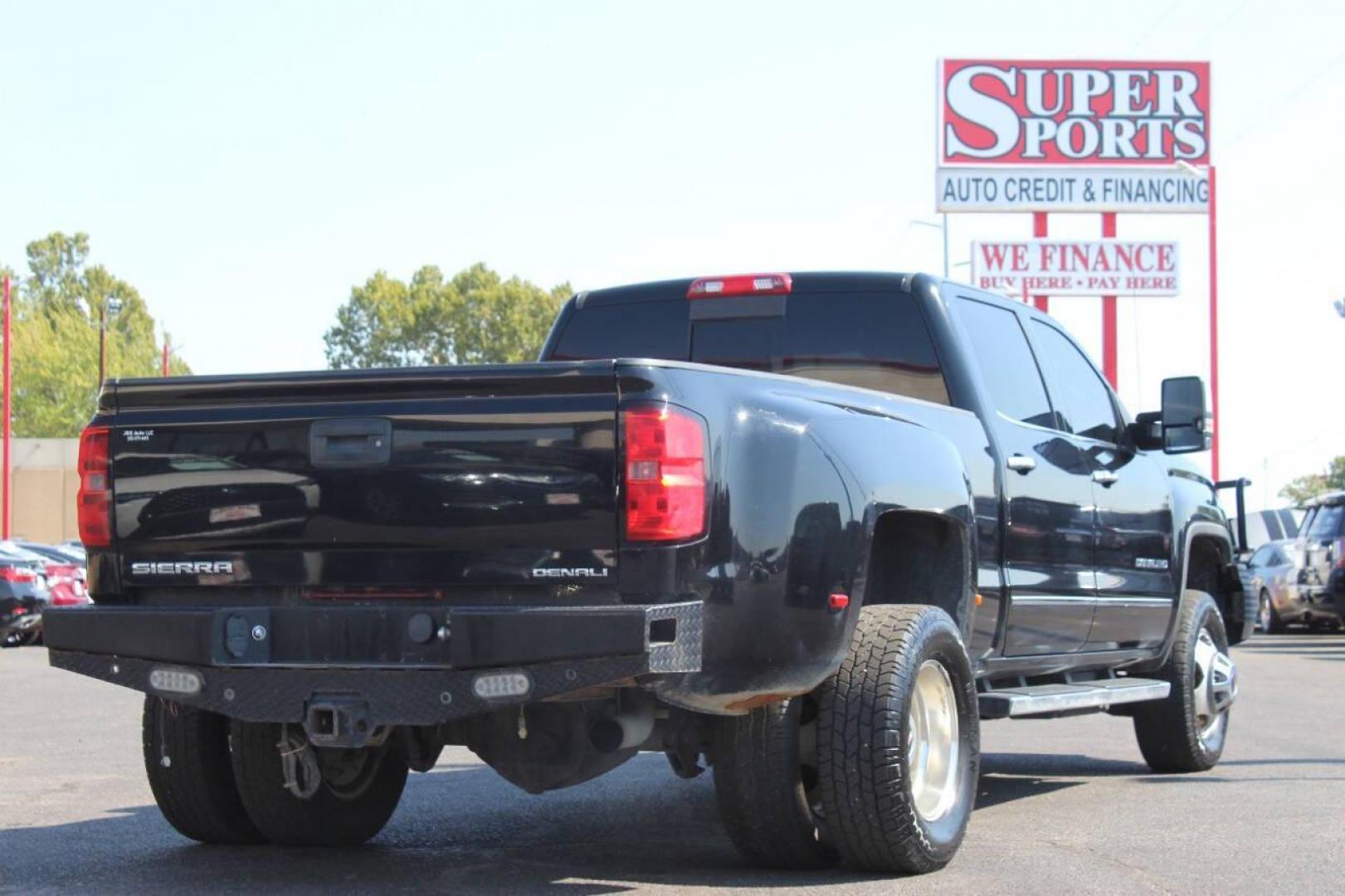 2015 Black GMC Sierra 3500HD Denali Crew Cab 4WD (1GT424E80FF) with an 6.6L V8 OHV 16 DIESEL engine, 6-Speed Automatic transmission, located at 4301 NW 39th , Oklahoma City, OK, 73112, (405) 949-5600, 35.512135, -97.598671 - Photo#3