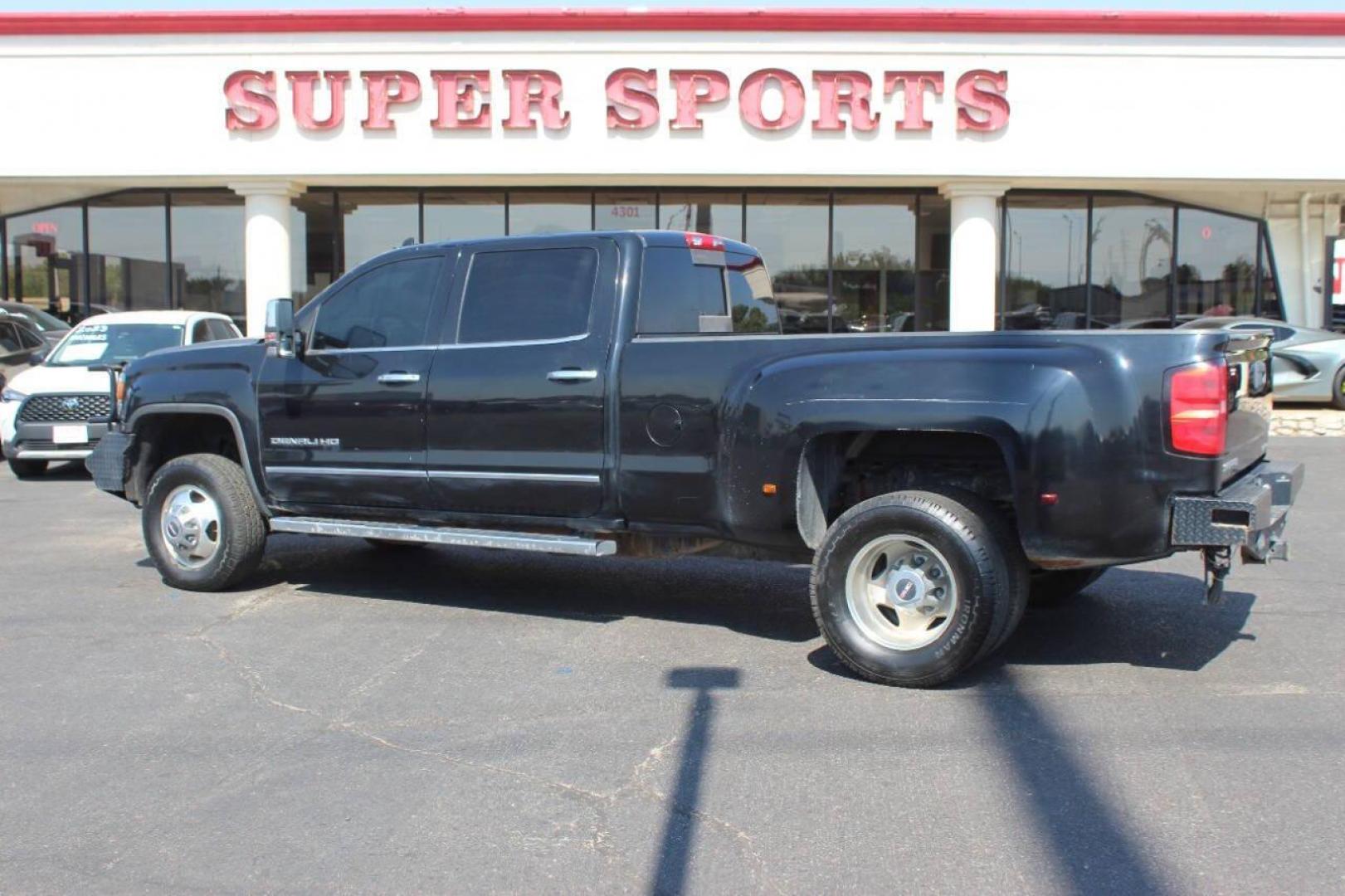 2015 Black GMC Sierra 3500HD Denali Crew Cab 4WD (1GT424E80FF) with an 6.6L V8 OHV 16 DIESEL engine, 6-Speed Automatic transmission, located at 4301 NW 39th , Oklahoma City, OK, 73112, (405) 949-5600, 35.512135, -97.598671 - NO DRIVERS LICENCE NO-FULL COVERAGE INSURANCE-NO CREDIT CHECK. COME ON OVER TO SUPERSPORTS AND TAKE A LOOK AND TEST DRIVE. PLEASE GIVE US A CALL AT (405) 949-5600. NO LICENSIA DE MANEJAR- NO SEGURO DE COBERTURA TOTAL- NO VERIFICACCION DE CREDITO. POR FAVOR VENGAN A SUPERSPORTS, ECHE UN - Photo#4