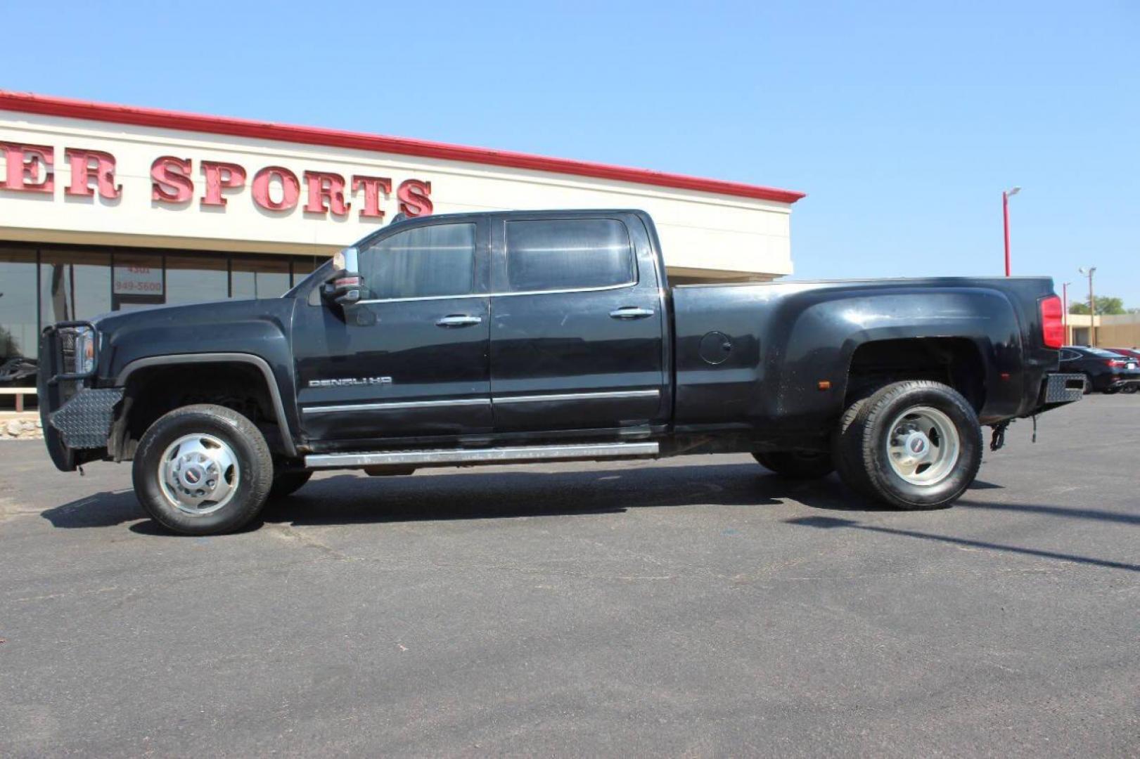 2015 Black GMC Sierra 3500HD Denali Crew Cab 4WD (1GT424E80FF) with an 6.6L V8 OHV 16 DIESEL engine, 6-Speed Automatic transmission, located at 4301 NW 39th , Oklahoma City, OK, 73112, (405) 949-5600, 35.512135, -97.598671 - NO DRIVERS LICENCE NO-FULL COVERAGE INSURANCE-NO CREDIT CHECK. COME ON OVER TO SUPERSPORTS AND TAKE A LOOK AND TEST DRIVE. PLEASE GIVE US A CALL AT (405) 949-5600. NO LICENSIA DE MANEJAR- NO SEGURO DE COBERTURA TOTAL- NO VERIFICACCION DE CREDITO. POR FAVOR VENGAN A SUPERSPORTS, ECHE UN - Photo#5