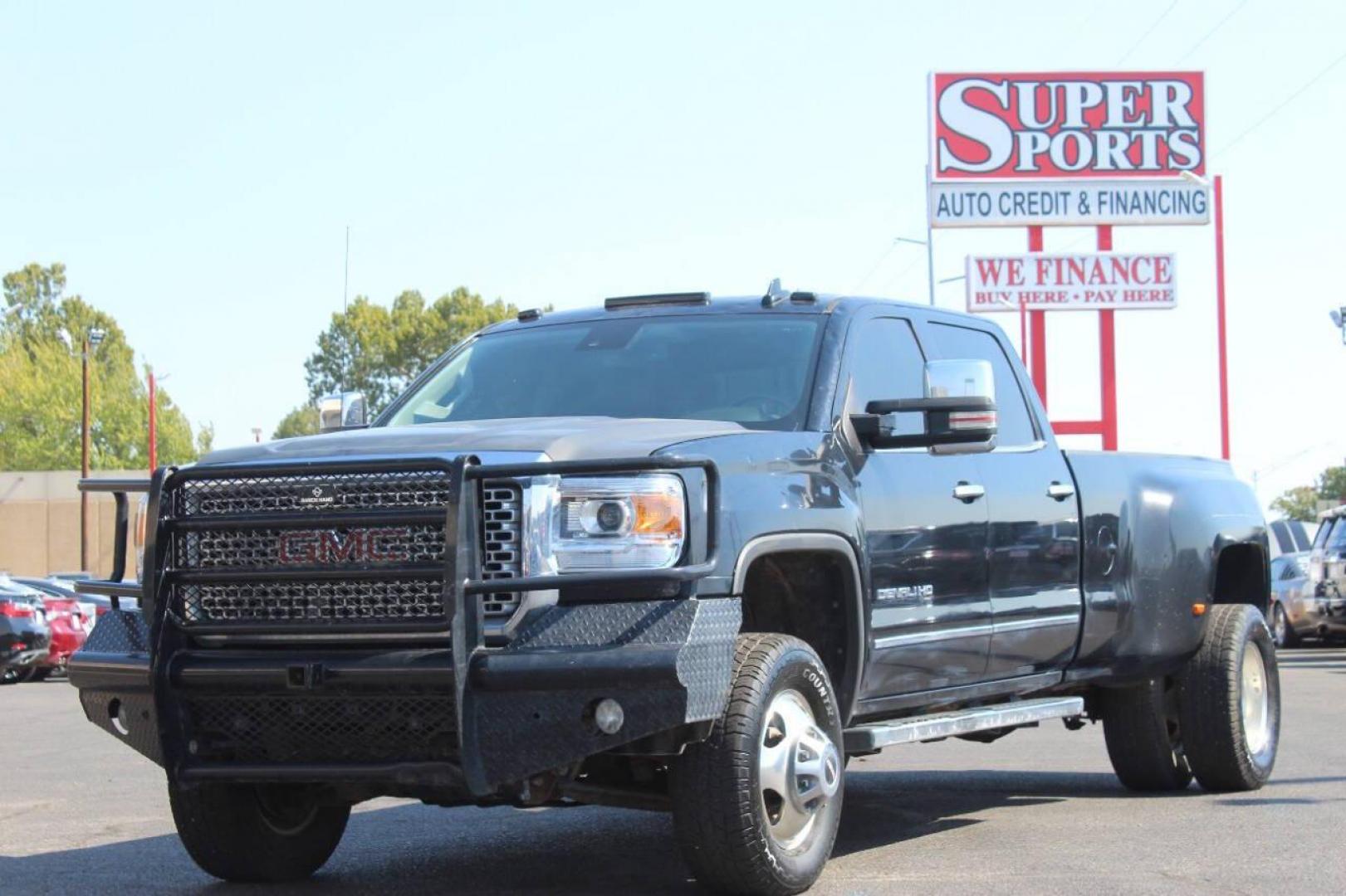 2015 Black GMC Sierra 3500HD Denali Crew Cab 4WD (1GT424E80FF) with an 6.6L V8 OHV 16 DIESEL engine, 6-Speed Automatic transmission, located at 4301 NW 39th , Oklahoma City, OK, 73112, (405) 949-5600, 35.512135, -97.598671 - NO DRIVERS LICENCE NO-FULL COVERAGE INSURANCE-NO CREDIT CHECK. COME ON OVER TO SUPERSPORTS AND TAKE A LOOK AND TEST DRIVE. PLEASE GIVE US A CALL AT (405) 949-5600. NO LICENSIA DE MANEJAR- NO SEGURO DE COBERTURA TOTAL- NO VERIFICACCION DE CREDITO. POR FAVOR VENGAN A SUPERSPORTS, ECHE UN - Photo#6