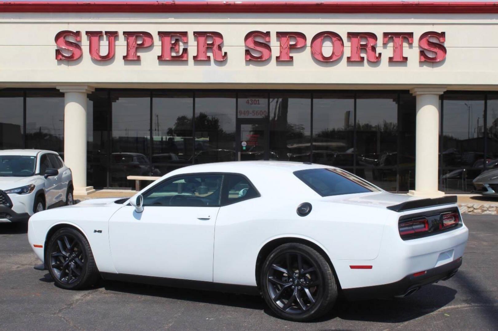 2023 White Dodge Challenger R/T Plus (2C3CDZBT7PH) with an 5.7L V8 OHV 16V engine, 6A transmission, located at 4301 NW 39th , Oklahoma City, OK, 73112, (405) 949-5600, 35.512135, -97.598671 - NO DRIVERS LICENCE NO-FULL COVERAGE INSURANCE-NO CREDIT CHECK. COME ON OVER TO SUPERSPORTS AND TAKE A LOOK AND TEST DRIVE. PLEASE GIVE US A CALL AT (405) 949-5600. NO LICENSIA DE MANEJAR- NO SEGURO DE COBERTURA TOTAL- NO VERIFICACCION DE CREDITO. POR FAVOR VENGAN A SUPERSPORTS, ECHE UN - Photo#4