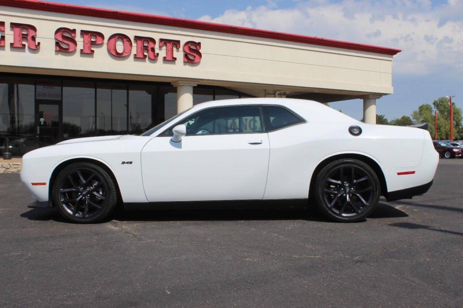 2023 White Dodge Challenger R/T Plus (2C3CDZBT7PH) with an 5.7L V8 OHV 16V engine, 6A transmission, located at 4301 NW 39th , Oklahoma City, OK, 73112, (405) 949-5600, 35.512135, -97.598671 - NO DRIVERS LICENCE NO-FULL COVERAGE INSURANCE-NO CREDIT CHECK. COME ON OVER TO SUPERSPORTS AND TAKE A LOOK AND TEST DRIVE. PLEASE GIVE US A CALL AT (405) 949-5600. NO LICENSIA DE MANEJAR- NO SEGURO DE COBERTURA TOTAL- NO VERIFICACCION DE CREDITO. POR FAVOR VENGAN A SUPERSPORTS, ECHE UN - Photo#5