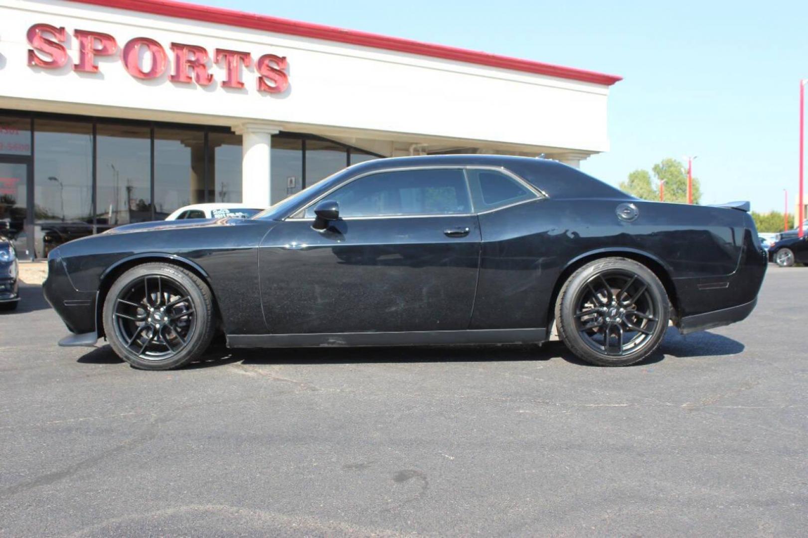 2020 Black Dodge Challenger SXT (2C3CDZAGXLH) with an 3.6L V6 DOHC 24V engine, 8A transmission, located at 4301 NW 39th , Oklahoma City, OK, 73112, (405) 949-5600, 35.512135, -97.598671 - NO DRIVERS LICENCE NO-FULL COVERAGE INSURANCE-NO CREDIT CHECK. COME ON OVER TO SUPERSPORTS AND TAKE A LOOK AND TEST DRIVE. PLEASE GIVE US A CALL AT (405) 949-5600. NO LICENSIA DE MANEJAR- NO SEGURO DE COBERTURA TOTAL- NO VERIFICACCION DE CREDITO. POR FAVOR VENGAN A SUPERSPORTS, ECHE UN - Photo#5