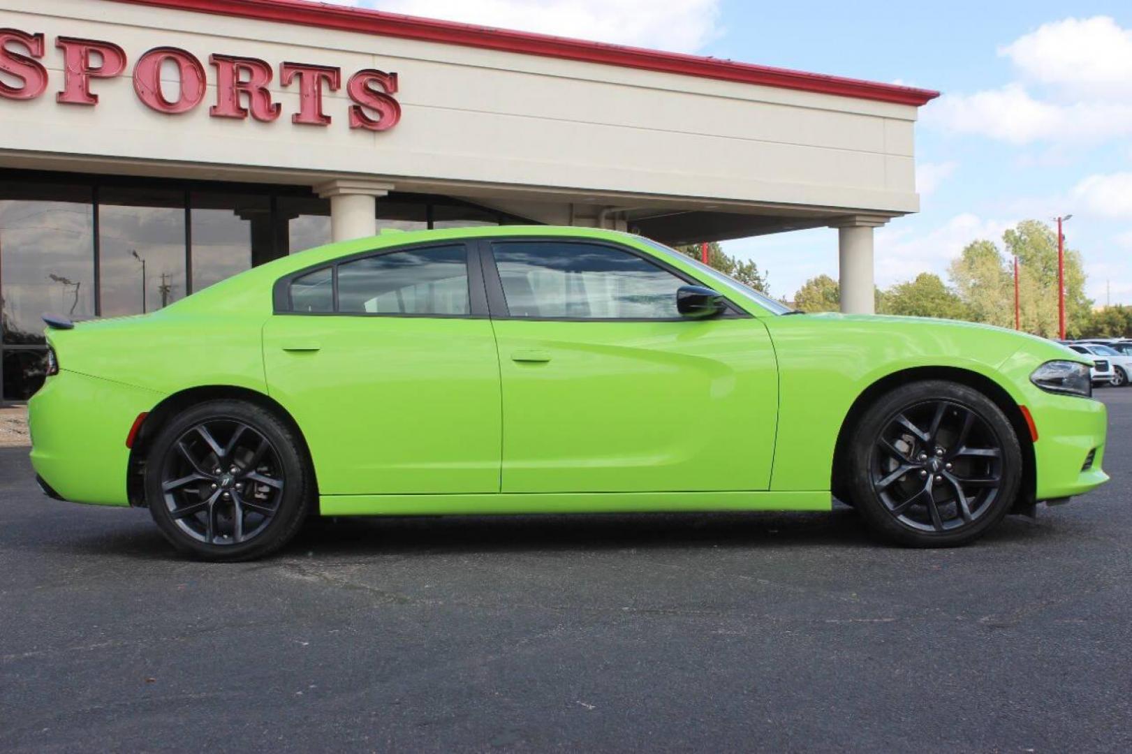 2023 Lime Green Dodge Charger SXT (2C3CDXBG6PH) with an 3.6L V6 DOHC 24V engine, 8A transmission, located at 4301 NW 39th , Oklahoma City, OK, 73112, (405) 949-5600, 35.512135, -97.598671 - NO DRIVERS LICENCE NO-FULL COVERAGE INSURANCE-NO CREDIT CHECK. COME ON OVER TO SUPERSPORTS AND TAKE A LOOK AND TEST DRIVE. PLEASE GIVE US A CALL AT (405) 949-5600. NO LICENSIA DE MANEJAR- NO SEGURO DE COBERTURA TOTAL- NO VERIFICACCION DE CREDITO. POR FAVOR VENGAN A SUPERSPORTS, ECHE UN - Photo#2