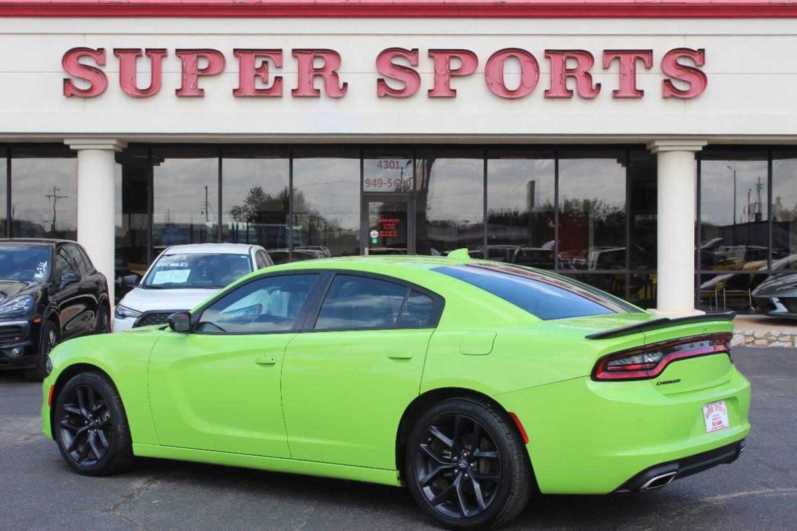 2023 Lime Green Dodge Charger SXT (2C3CDXBG6PH) with an 3.6L V6 DOHC 24V engine, 8A transmission, located at 4301 NW 39th , Oklahoma City, OK, 73112, (405) 949-5600, 35.512135, -97.598671 - NO DRIVERS LICENCE NO-FULL COVERAGE INSURANCE-NO CREDIT CHECK. COME ON OVER TO SUPERSPORTS AND TAKE A LOOK AND TEST DRIVE. PLEASE GIVE US A CALL AT (405) 949-5600. NO LICENSIA DE MANEJAR- NO SEGURO DE COBERTURA TOTAL- NO VERIFICACCION DE CREDITO. POR FAVOR VENGAN A SUPERSPORTS, ECHE UN - Photo#4