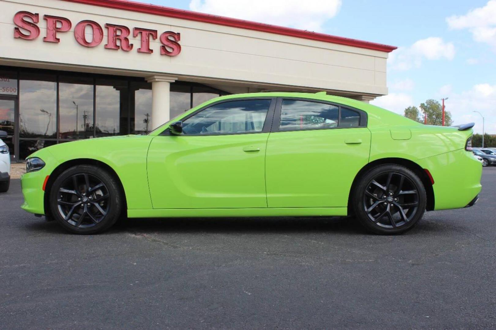 2023 Lime Green Dodge Charger SXT (2C3CDXBG6PH) with an 3.6L V6 DOHC 24V engine, 8A transmission, located at 4301 NW 39th , Oklahoma City, OK, 73112, (405) 949-5600, 35.512135, -97.598671 - NO DRIVERS LICENCE NO-FULL COVERAGE INSURANCE-NO CREDIT CHECK. COME ON OVER TO SUPERSPORTS AND TAKE A LOOK AND TEST DRIVE. PLEASE GIVE US A CALL AT (405) 949-5600. NO LICENSIA DE MANEJAR- NO SEGURO DE COBERTURA TOTAL- NO VERIFICACCION DE CREDITO. POR FAVOR VENGAN A SUPERSPORTS, ECHE UN - Photo#5