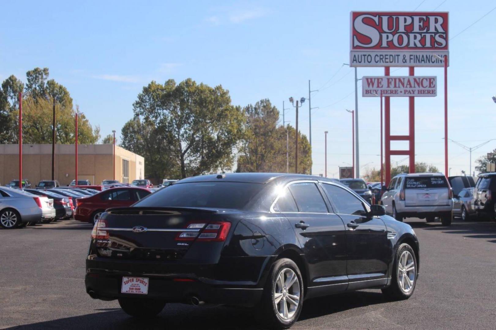 2017 Black Ford Taurus SEL FWD (1FAHP2E8XHG) with an 3.5L V6 DOHC 24V engine, 6A transmission, located at 4301 NW 39th , Oklahoma City, OK, 73112, (405) 949-5600, 35.512135, -97.598671 - NO DRIVERS LICENCE NO-FULL COVERAGE INSURANCE-NO CREDIT CHECK. COME ON OVER TO SUPERSPORTS AND TAKE A LOOK AND TEST DRIVE. PLEASE GIVE US A CALL AT (405) 949-5600. NO LICENSIA DE MANEJAR- NO SEGURO DE COBERTURA TOTAL- NO VERIFICACCION DE CREDITO. POR FAVOR VENGAN A SUPERSPORTS, ECHE UN - Photo#3