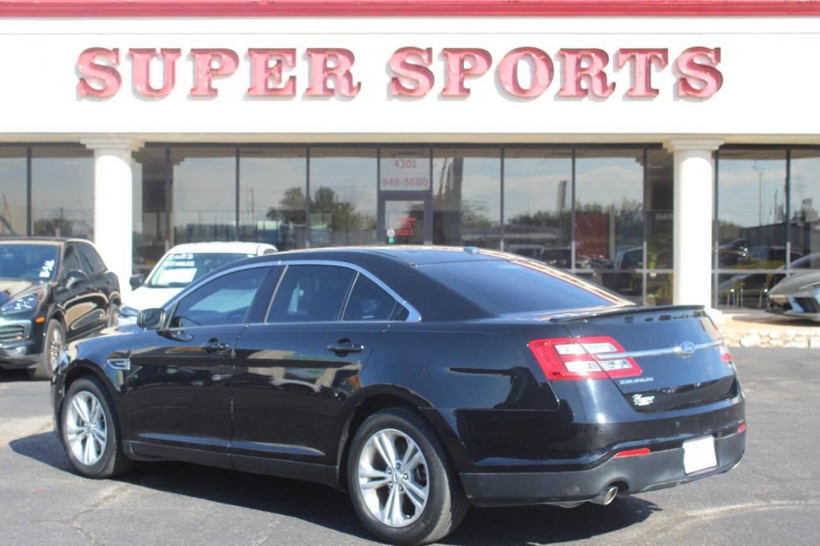 2017 Black Ford Taurus SEL FWD (1FAHP2E8XHG) with an 3.5L V6 DOHC 24V engine, 6A transmission, located at 4301 NW 39th , Oklahoma City, OK, 73112, (405) 949-5600, 35.512135, -97.598671 - NO DRIVERS LICENCE NO-FULL COVERAGE INSURANCE-NO CREDIT CHECK. COME ON OVER TO SUPERSPORTS AND TAKE A LOOK AND TEST DRIVE. PLEASE GIVE US A CALL AT (405) 949-5600. NO LICENSIA DE MANEJAR- NO SEGURO DE COBERTURA TOTAL- NO VERIFICACCION DE CREDITO. POR FAVOR VENGAN A SUPERSPORTS, ECHE UN - Photo#4