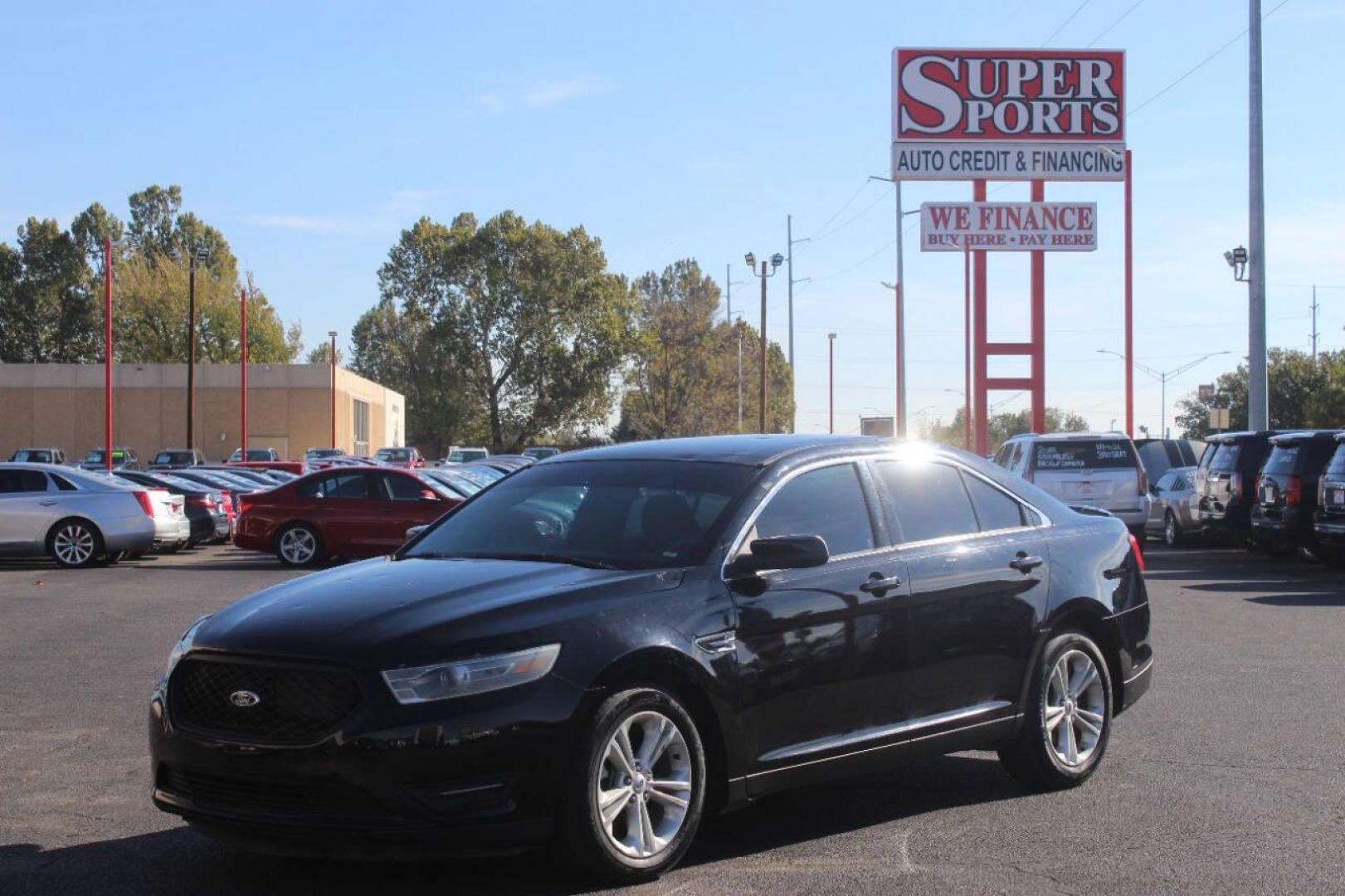 2017 Black Ford Taurus SEL FWD (1FAHP2E8XHG) with an 3.5L V6 DOHC 24V engine, 6A transmission, located at 4301 NW 39th , Oklahoma City, OK, 73112, (405) 949-5600, 35.512135, -97.598671 - NO DRIVERS LICENCE NO-FULL COVERAGE INSURANCE-NO CREDIT CHECK. COME ON OVER TO SUPERSPORTS AND TAKE A LOOK AND TEST DRIVE. PLEASE GIVE US A CALL AT (405) 949-5600. NO LICENSIA DE MANEJAR- NO SEGURO DE COBERTURA TOTAL- NO VERIFICACCION DE CREDITO. POR FAVOR VENGAN A SUPERSPORTS, ECHE UN - Photo#6