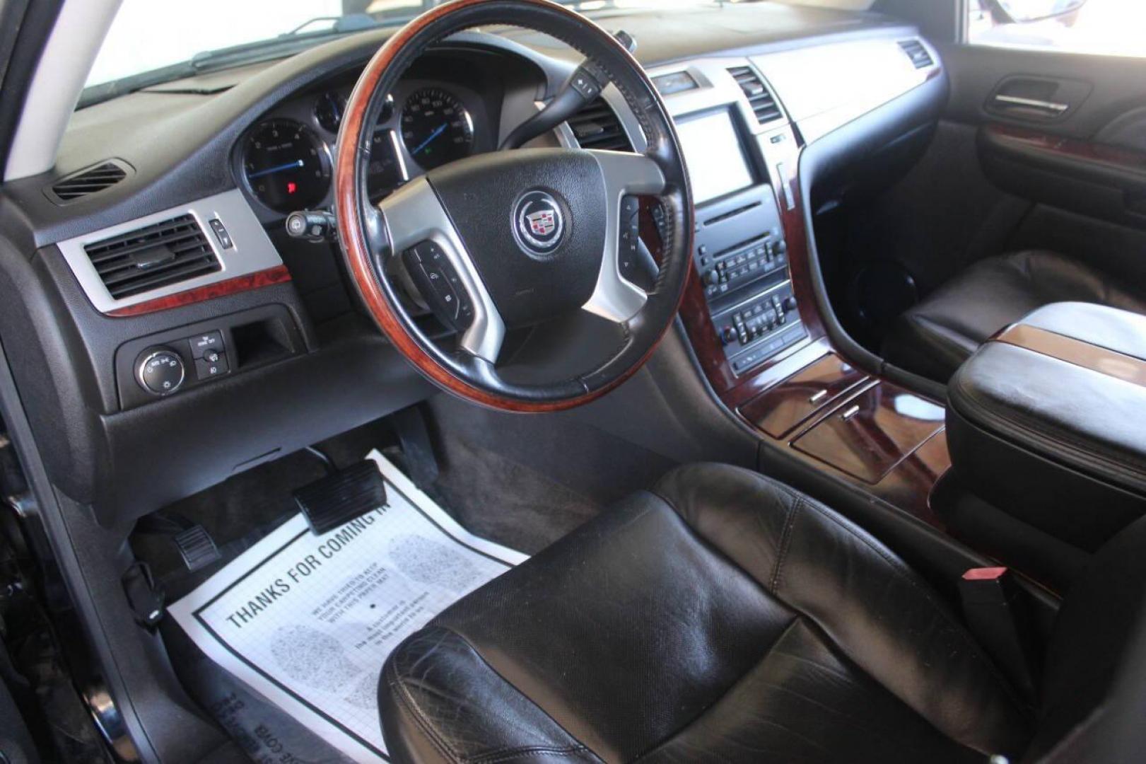 2008 Black Cadillac Escalade AWD (1GYFK63808R) with an 6.2L V8 OHV 16V engine, 6-Speed Automatic Overdrive transmission, located at 4301 NW 39th , Oklahoma City, OK, 73112, (405) 949-5600, 35.512135, -97.598671 - NO DRIVERS LICENCE NO-FULL COVERAGE INSURANCE-NO CREDIT CHECK. COME ON OVER TO SUPERSPORTS AND TAKE A LOOK AND TEST DRIVE. PLEASE GIVE US A CALL AT (405) 949-5600. NO LICENSIA DE MANEJAR- NO SEGURO DE COBERTURA TOTAL- NO VERIFICACCION DE CREDITO. POR FAVOR VENGAN A SUPERSPORTS, ECHE UN - Photo#14