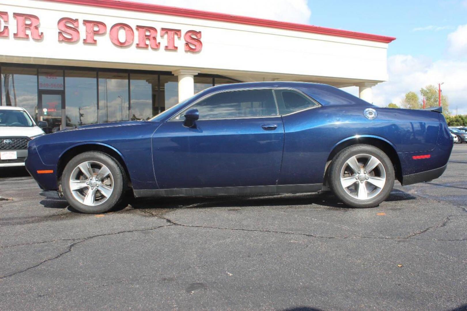 2016 Blue Dodge Challenger SXT (2C3CDZAG8GH) with an 3.6L V6 DOHC 24V engine, 5A transmission, located at 4301 NW 39th , Oklahoma City, OK, 73112, (405) 949-5600, 35.512135, -97.598671 - NO DRIVERS LICENCE NO-FULL COVERAGE INSURANCE-NO CREDIT CHECK. COME ON OVER TO SUPERSPORTS AND TAKE A LOOK AND TEST DRIVE. PLEASE GIVE US A CALL AT (405) 949-5600. NO LICENSIA DE MANEJAR- NO SEGURO DE COBERTURA TOTAL- NO VERIFICACCION DE CREDITO. POR FAVOR VENGAN A SUPERSPORTS, ECHE UN - Photo#5