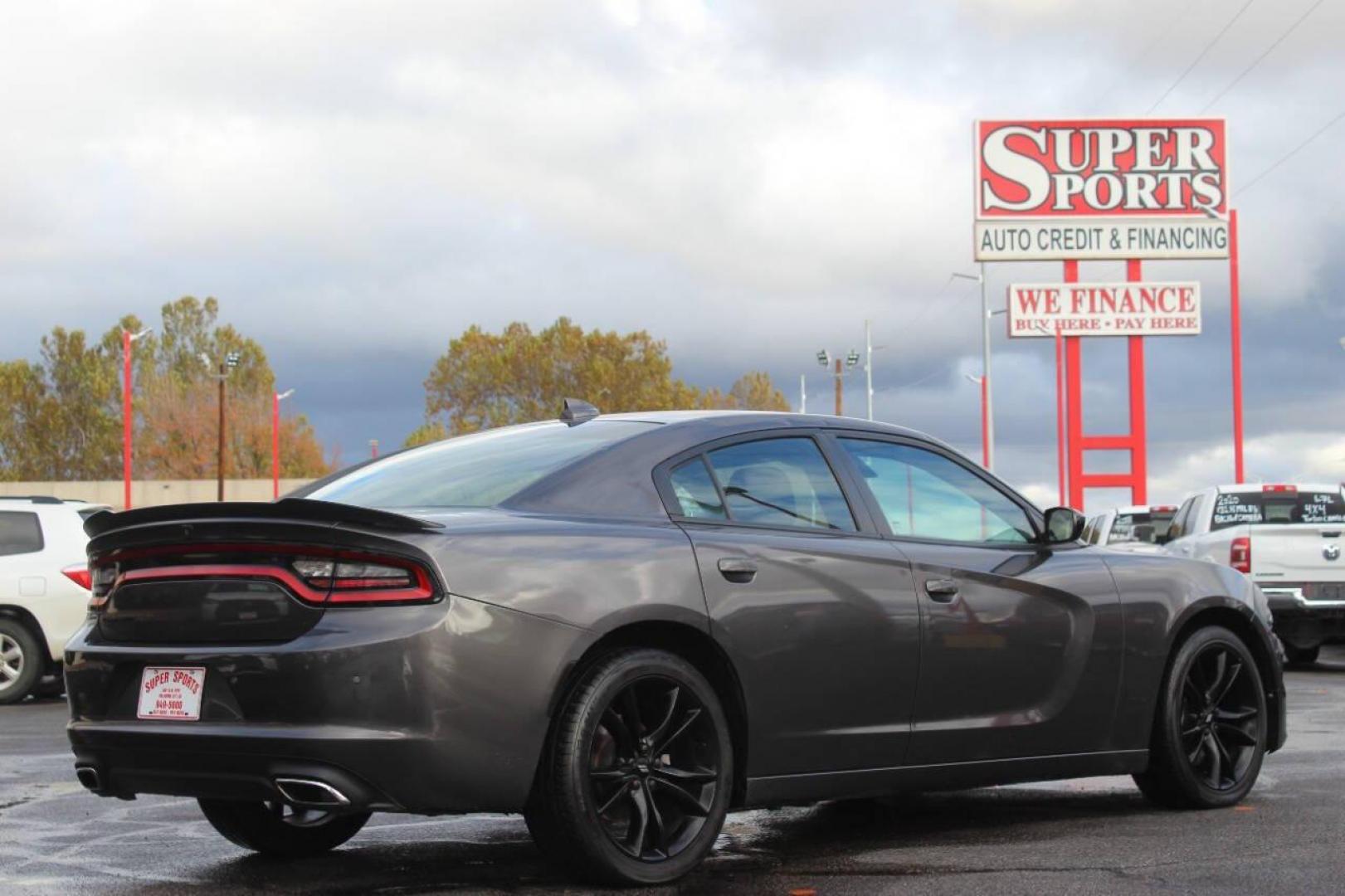 2018 Gray Dodge Charger SXT (2C3CDXHG8JH) with an 3.6L V6 DOHC 24V engine, 8A transmission, located at 4301 NW 39th , Oklahoma City, OK, 73112, (405) 949-5600, 35.512135, -97.598671 - NO DRIVERS LICENCE NO-FULL COVERAGE INSURANCE-NO CREDIT CHECK. COME ON OVER TO SUPERSPORTS AND TAKE A LOOK AND TEST DRIVE. PLEASE GIVE US A CALL AT (405) 949-5600. NO LICENSIA DE MANEJAR- NO SEGURO DE COBERTURA TOTAL- NO VERIFICACCION DE CREDITO. POR FAVOR VENGAN A SUPERSPORTS, ECHE UN - Photo#3