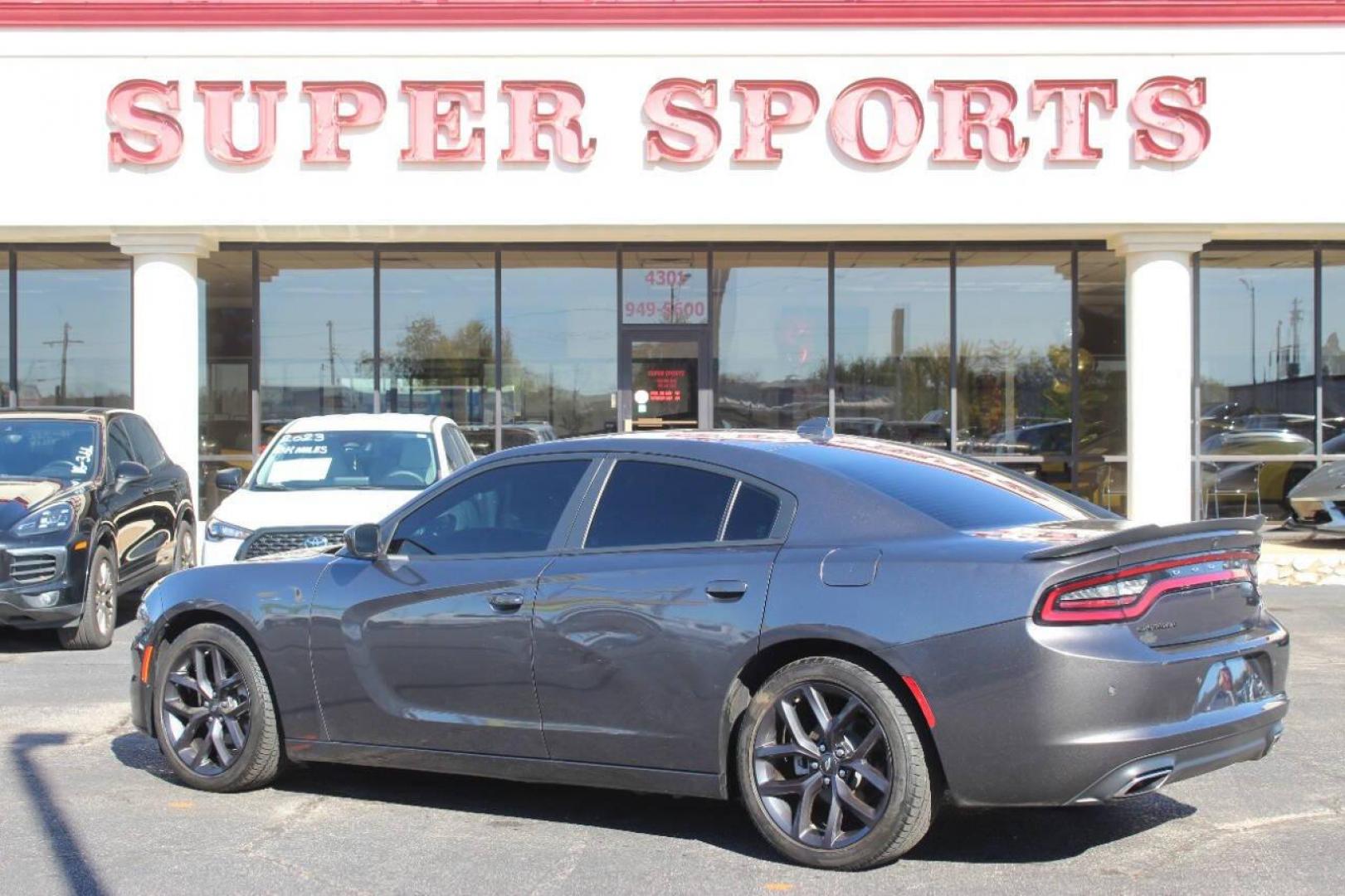 2023 Gray Dodge Charger SXT (2C3CDXBG4PH) with an 3.6L V6 DOHC 24V engine, 8A transmission, located at 4301 NW 39th , Oklahoma City, OK, 73112, (405) 949-5600, 35.512135, -97.598671 - NO DRIVERS LICENCE NO-FULL COVERAGE INSURANCE-NO CREDIT CHECK. COME ON OVER TO SUPERSPORTS AND TAKE A LOOK AND TEST DRIVE. PLEASE GIVE US A CALL AT (405) 949-5600. NO LICENSIA DE MANEJAR- NO SEGURO DE COBERTURA TOTAL- NO VERIFICACCION DE CREDITO. POR FAVOR VENGAN A SUPERSPORTS, ECHE UN - Photo#4