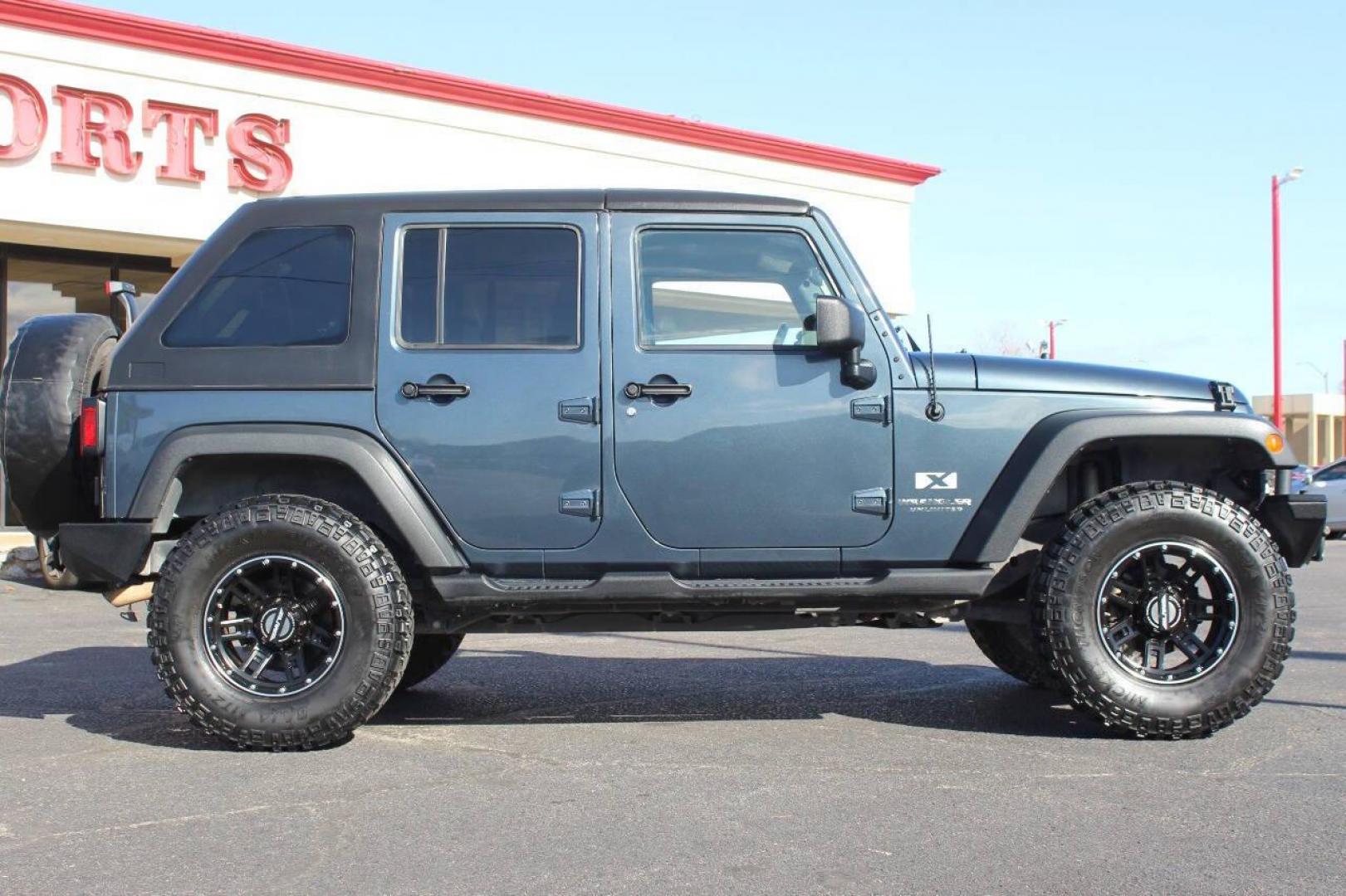 2008 Blue Jeep Wrangler Unlimited X 4WD (1J4GA39138L) with an 3.8L V6 OHV 12V engine, Automatic 4-Speed transmission, located at 4301 NW 39th , Oklahoma City, OK, 73112, (405) 949-5600, 35.512135, -97.598671 - NO DRIVERS LICENCE NO-FULL COVERAGE INSURANCE-NO CREDIT CHECK. COME ON OVER TO SUPERSPORTS AND TAKE A LOOK AND TEST DRIVE. PLEASE GIVE US A CALL AT (405) 949-5600. NO LICENSIA DE MANEJAR- NO SEGURO DE COBERTURA TOTAL- NO VERIFICACCION DE CREDITO. POR FAVOR VENGAN A SUPERSPORTS, ECHE UN - Photo#2