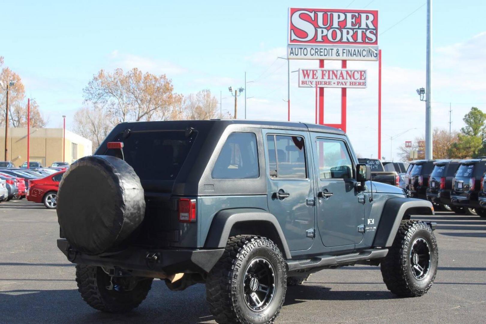 2008 Blue Jeep Wrangler Unlimited X 4WD (1J4GA39138L) with an 3.8L V6 OHV 12V engine, Automatic 4-Speed transmission, located at 4301 NW 39th , Oklahoma City, OK, 73112, (405) 949-5600, 35.512135, -97.598671 - NO DRIVERS LICENCE NO-FULL COVERAGE INSURANCE-NO CREDIT CHECK. COME ON OVER TO SUPERSPORTS AND TAKE A LOOK AND TEST DRIVE. PLEASE GIVE US A CALL AT (405) 949-5600. NO LICENSIA DE MANEJAR- NO SEGURO DE COBERTURA TOTAL- NO VERIFICACCION DE CREDITO. POR FAVOR VENGAN A SUPERSPORTS, ECHE UN - Photo#3