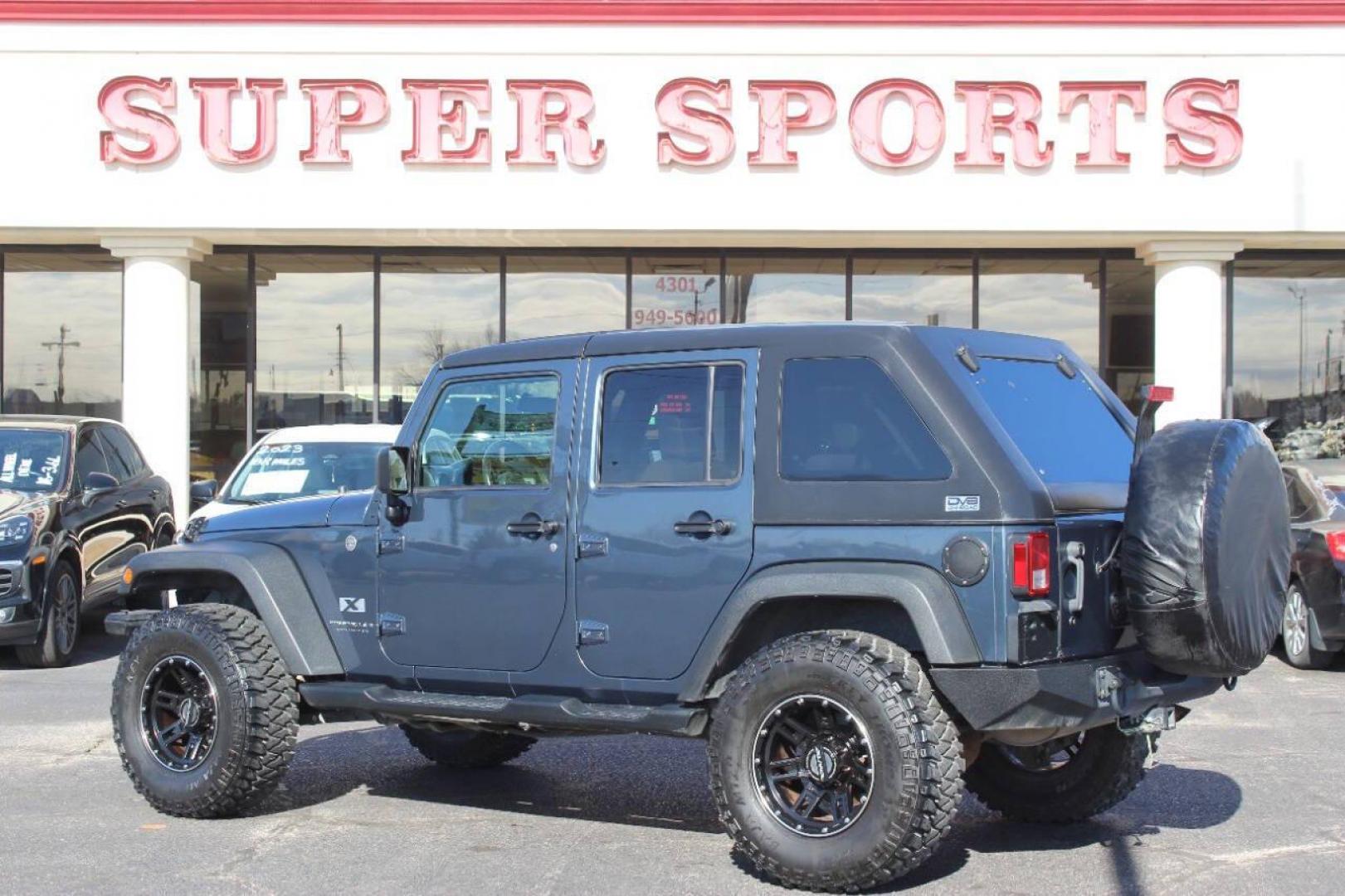 2008 Blue Jeep Wrangler Unlimited X 4WD (1J4GA39138L) with an 3.8L V6 OHV 12V engine, Automatic 4-Speed transmission, located at 4301 NW 39th , Oklahoma City, OK, 73112, (405) 949-5600, 35.512135, -97.598671 - NO DRIVERS LICENCE NO-FULL COVERAGE INSURANCE-NO CREDIT CHECK. COME ON OVER TO SUPERSPORTS AND TAKE A LOOK AND TEST DRIVE. PLEASE GIVE US A CALL AT (405) 949-5600. NO LICENSIA DE MANEJAR- NO SEGURO DE COBERTURA TOTAL- NO VERIFICACCION DE CREDITO. POR FAVOR VENGAN A SUPERSPORTS, ECHE UN - Photo#5