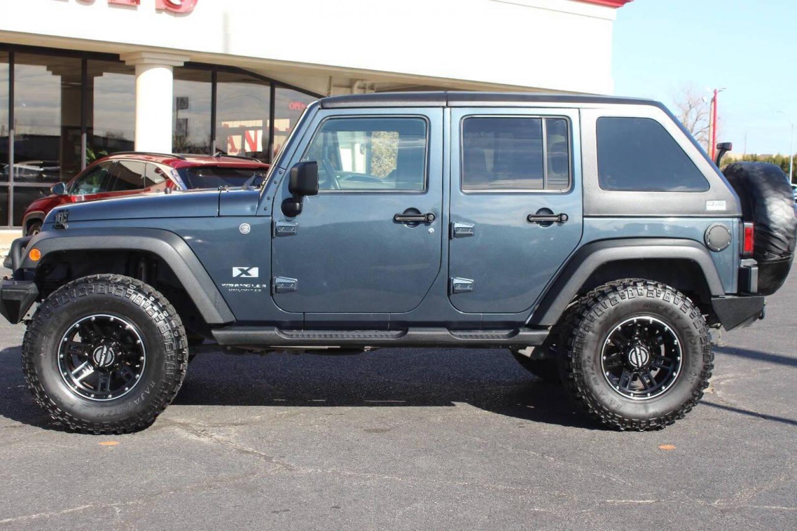 2008 Blue Jeep Wrangler Unlimited X 4WD (1J4GA39138L) with an 3.8L V6 OHV 12V engine, Automatic 4-Speed transmission, located at 4301 NW 39th , Oklahoma City, OK, 73112, (405) 949-5600, 35.512135, -97.598671 - NO DRIVERS LICENCE NO-FULL COVERAGE INSURANCE-NO CREDIT CHECK. COME ON OVER TO SUPERSPORTS AND TAKE A LOOK AND TEST DRIVE. PLEASE GIVE US A CALL AT (405) 949-5600. NO LICENSIA DE MANEJAR- NO SEGURO DE COBERTURA TOTAL- NO VERIFICACCION DE CREDITO. POR FAVOR VENGAN A SUPERSPORTS, ECHE UN - Photo#6