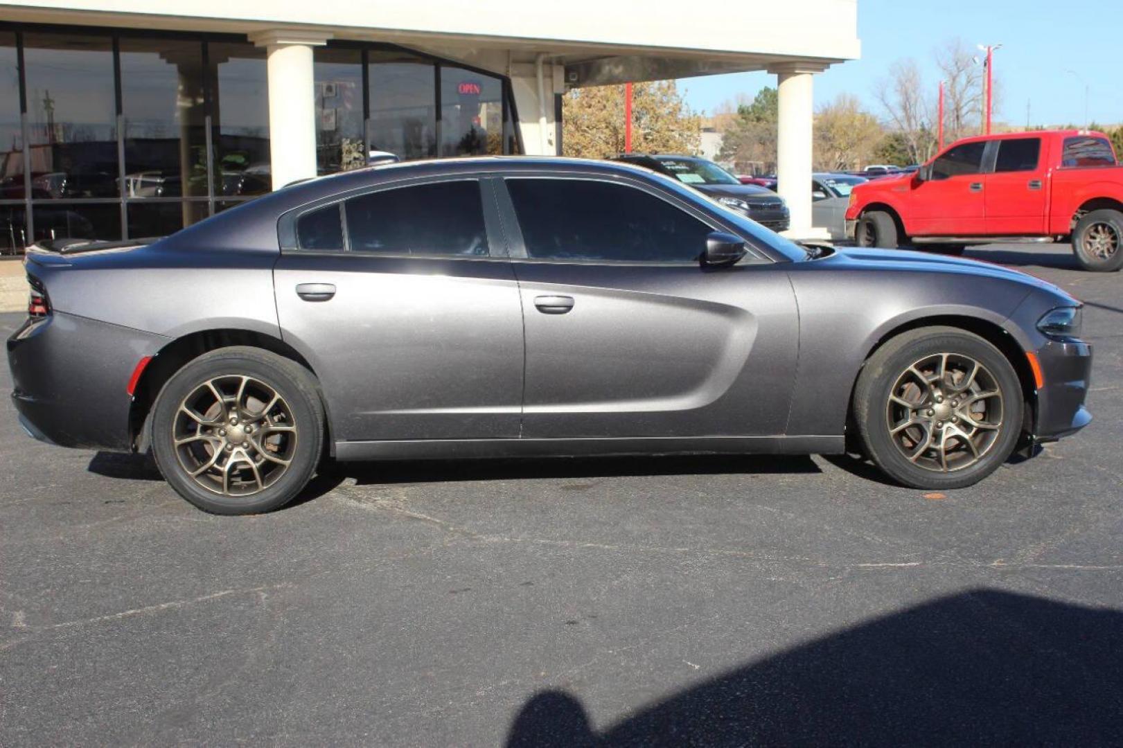 2015 Gray Dodge Charger SXT AWD (2C3CDXJG2FH) with an 3.6L V6 DOHC 24V engine, 8-Speed Automatic transmission, located at 4301 NW 39th , Oklahoma City, OK, 73112, (405) 949-5600, 35.512135, -97.598671 - NO DRIVERS LICENCE NO-FULL COVERAGE INSURANCE-NO CREDIT CHECK. COME ON OVER TO SUPERSPORTS AND TAKE A LOOK AND TEST DRIVE. PLEASE GIVE US A CALL AT (405) 949-5600. NO LICENSIA DE MANEJAR- NO SEGURO DE COBERTURA TOTAL- NO VERIFICACCION DE CREDITO. POR FAVOR VENGAN A SUPERSPORTS, ECHE U - Photo#2