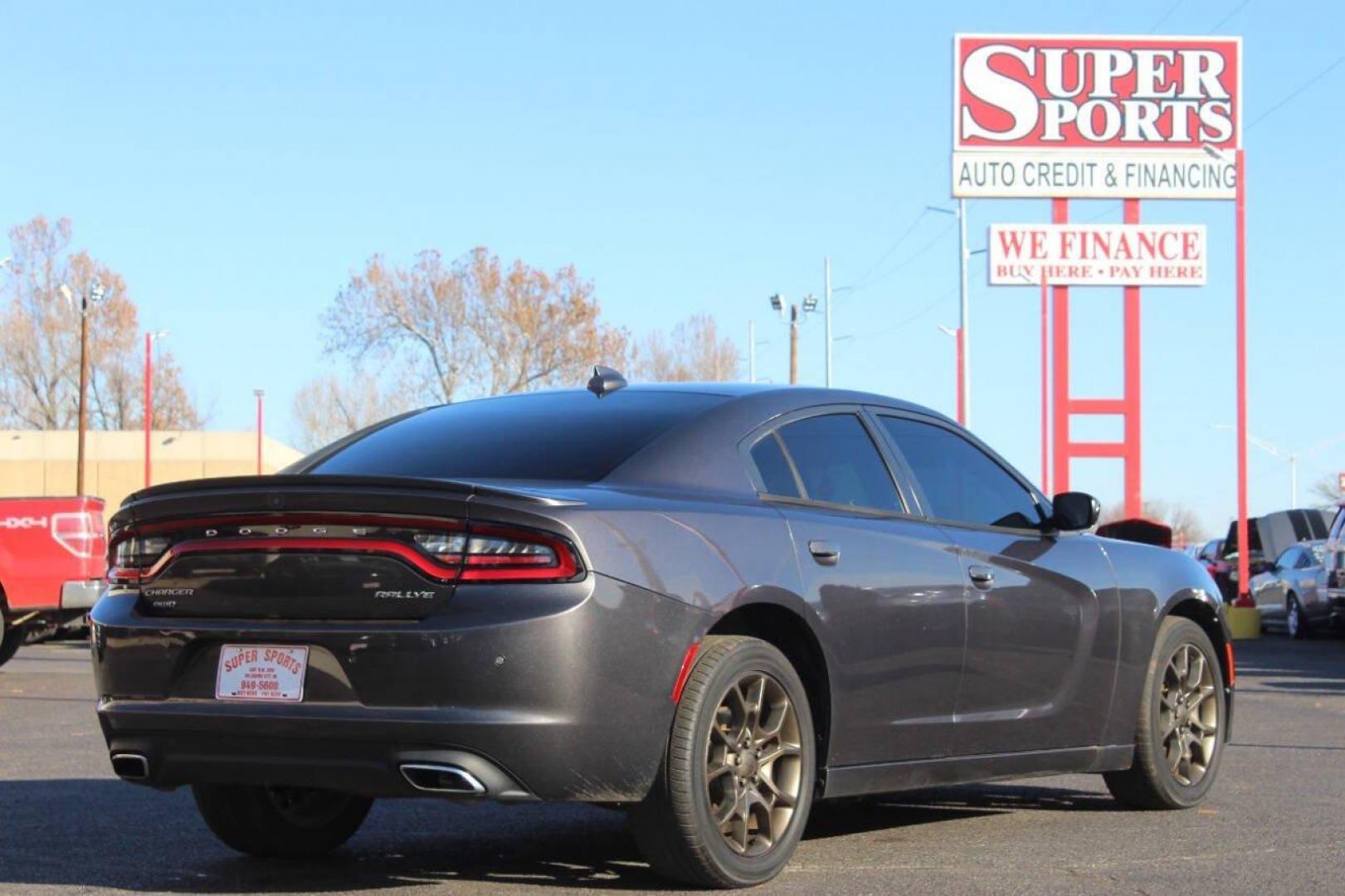 2015 Gray Dodge Charger SXT AWD (2C3CDXJG2FH) with an 3.6L V6 DOHC 24V engine, 8-Speed Automatic transmission, located at 4301 NW 39th , Oklahoma City, OK, 73112, (405) 949-5600, 35.512135, -97.598671 - NO DRIVERS LICENCE NO-FULL COVERAGE INSURANCE-NO CREDIT CHECK. COME ON OVER TO SUPERSPORTS AND TAKE A LOOK AND TEST DRIVE. PLEASE GIVE US A CALL AT (405) 949-5600. NO LICENSIA DE MANEJAR- NO SEGURO DE COBERTURA TOTAL- NO VERIFICACCION DE CREDITO. POR FAVOR VENGAN A SUPERSPORTS, ECHE U - Photo#3