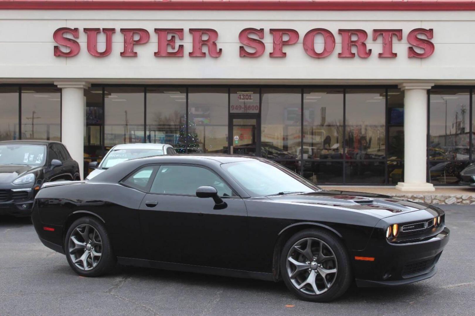 2016 Black Dodge Challenger SXT (2C3CDZAG6GH) with an 3.6L V6 DOHC 24V engine, 5A transmission, located at 4301 NW 39th , Oklahoma City, OK, 73112, (405) 949-5600, 35.512135, -97.598671 - NO DRIVERS LICENCE NO-FULL COVERAGE INSURANCE-NO CREDIT CHECK. COME ON OVER TO SUPERSPORTS AND TAKE A LOOK AND TEST DRIVE. PLEASE GIVE US A CALL AT (405) 949-5600. NO LICENSIA DE MANEJAR- NO SEGURO DE COBERTURA TOTAL- NO VERIFICACCION DE CREDITO. POR FAVOR VENGAN A SUPERSPORTS, ECHE U - Photo#0