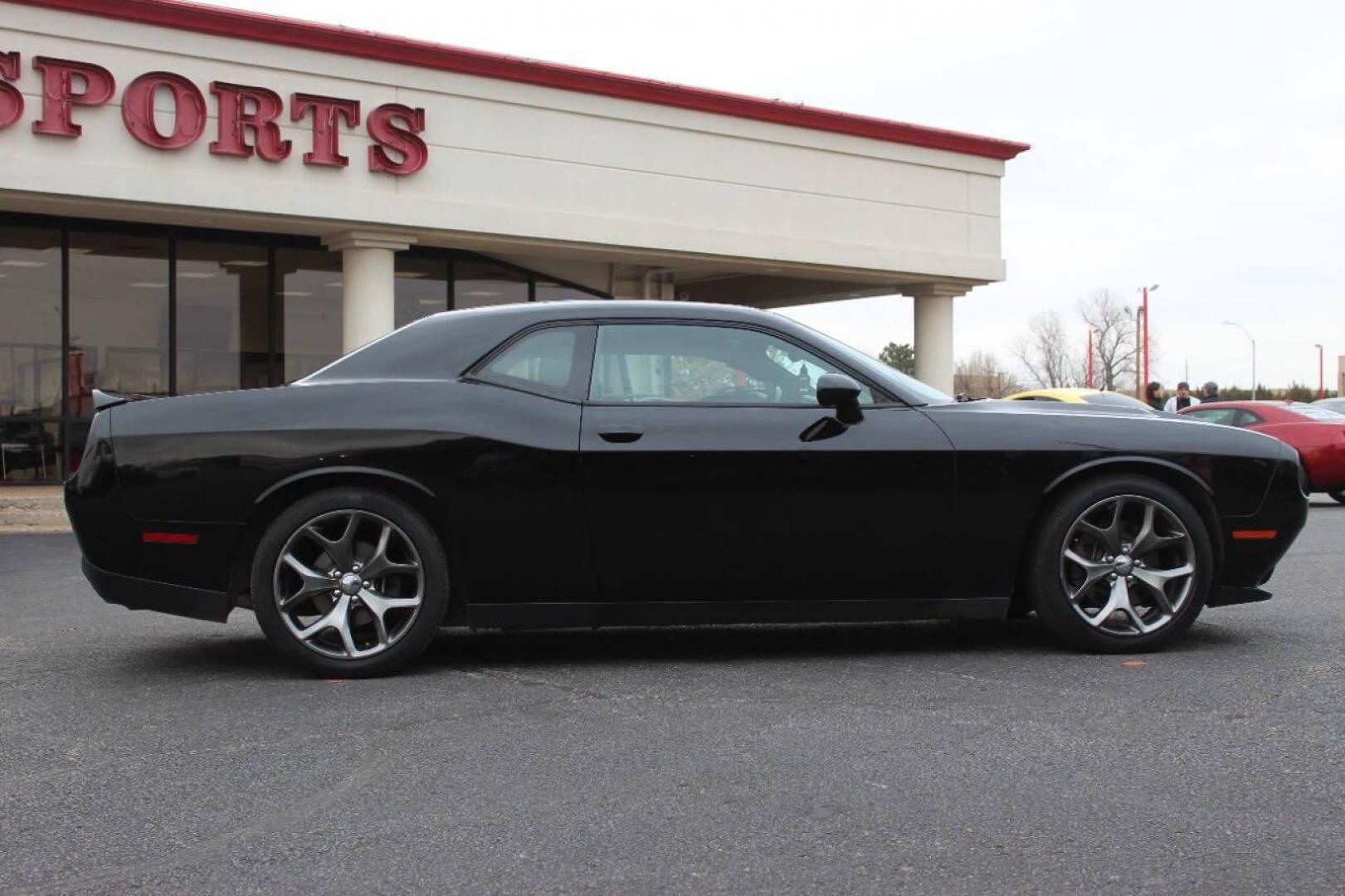 2016 Black Dodge Challenger SXT (2C3CDZAG6GH) with an 3.6L V6 DOHC 24V engine, 5A transmission, located at 4301 NW 39th , Oklahoma City, OK, 73112, (405) 949-5600, 35.512135, -97.598671 - NO DRIVERS LICENCE NO-FULL COVERAGE INSURANCE-NO CREDIT CHECK. COME ON OVER TO SUPERSPORTS AND TAKE A LOOK AND TEST DRIVE. PLEASE GIVE US A CALL AT (405) 949-5600. NO LICENSIA DE MANEJAR- NO SEGURO DE COBERTURA TOTAL- NO VERIFICACCION DE CREDITO. POR FAVOR VENGAN A SUPERSPORTS, ECHE U - Photo#2