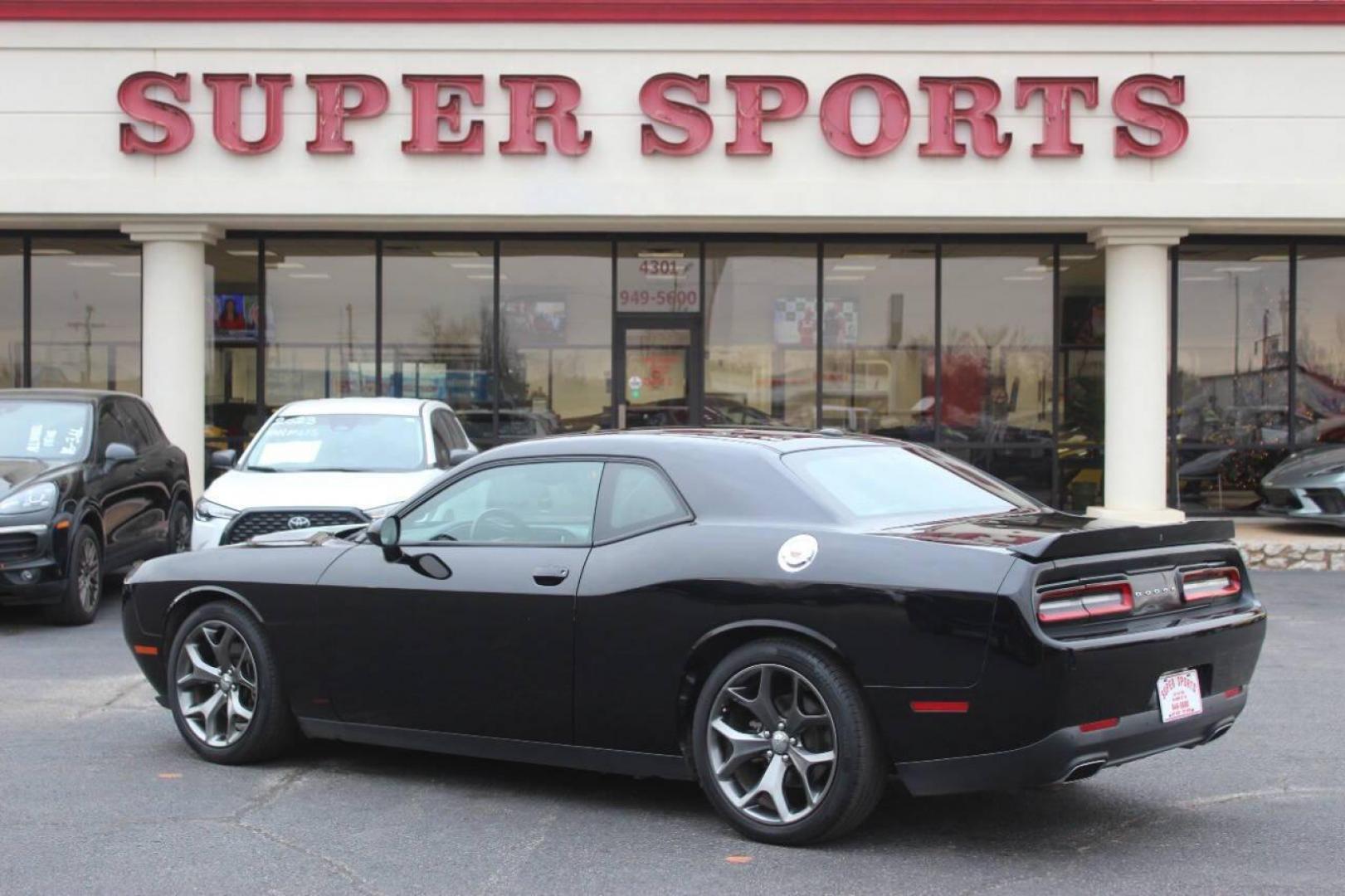 2016 Black Dodge Challenger SXT (2C3CDZAG6GH) with an 3.6L V6 DOHC 24V engine, 5A transmission, located at 4301 NW 39th , Oklahoma City, OK, 73112, (405) 949-5600, 35.512135, -97.598671 - NO DRIVERS LICENCE NO-FULL COVERAGE INSURANCE-NO CREDIT CHECK. COME ON OVER TO SUPERSPORTS AND TAKE A LOOK AND TEST DRIVE. PLEASE GIVE US A CALL AT (405) 949-5600. NO LICENSIA DE MANEJAR- NO SEGURO DE COBERTURA TOTAL- NO VERIFICACCION DE CREDITO. POR FAVOR VENGAN A SUPERSPORTS, ECHE U - Photo#4