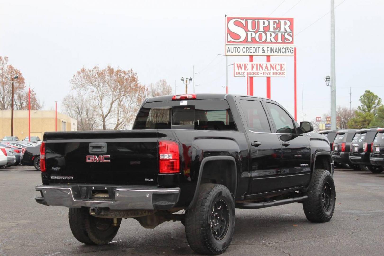 2016 Black GMC Sierra 1500 SLE Crew Cab Long Box 4WD (3GTU2MEC1GG) with an 5.3L V8 OHV 16V engine, 6A transmission, located at 4301 NW 39th , Oklahoma City, OK, 73112, (405) 949-5600, 35.512135, -97.598671 - NO DRIVERS LICENCE NO-FULL COVERAGE INSURANCE-NO CREDIT CHECK. COME ON OVER TO SUPERSPORTS AND TAKE A LOOK AND TEST DRIVE. PLEASE GIVE US A CALL AT (405) 949-5600. NO LICENSIA DE MANEJAR- NO SEGURO DE COBERTURA TOTAL- NO VERIFICACCION DE CREDITO. POR FAVOR VENGAN A SUPERSPORTS, ECHE U - Photo#3